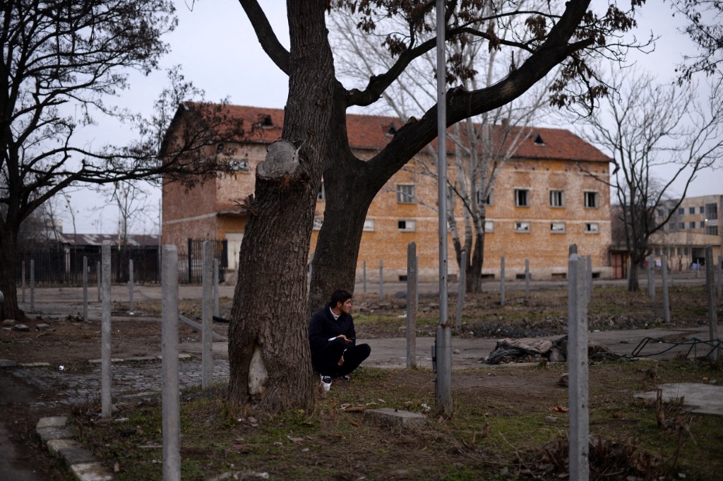 A Syrian refugee is pictured in the largest Bulgarian camp in the town of Harmanli on January 21, 2014. Tonnes of humanitarian aid -- including clothes, food and hygiene materials -- has started trickling in from non-governmental groups in the country and abroad to the camps in EU's poorest country after the UN raised alarm over a "human emergency" on the EU's southern fringe. AFP PHOTO / DIMITAR DILKOFF (Photo by DIMITAR DILKOFF / AFP)