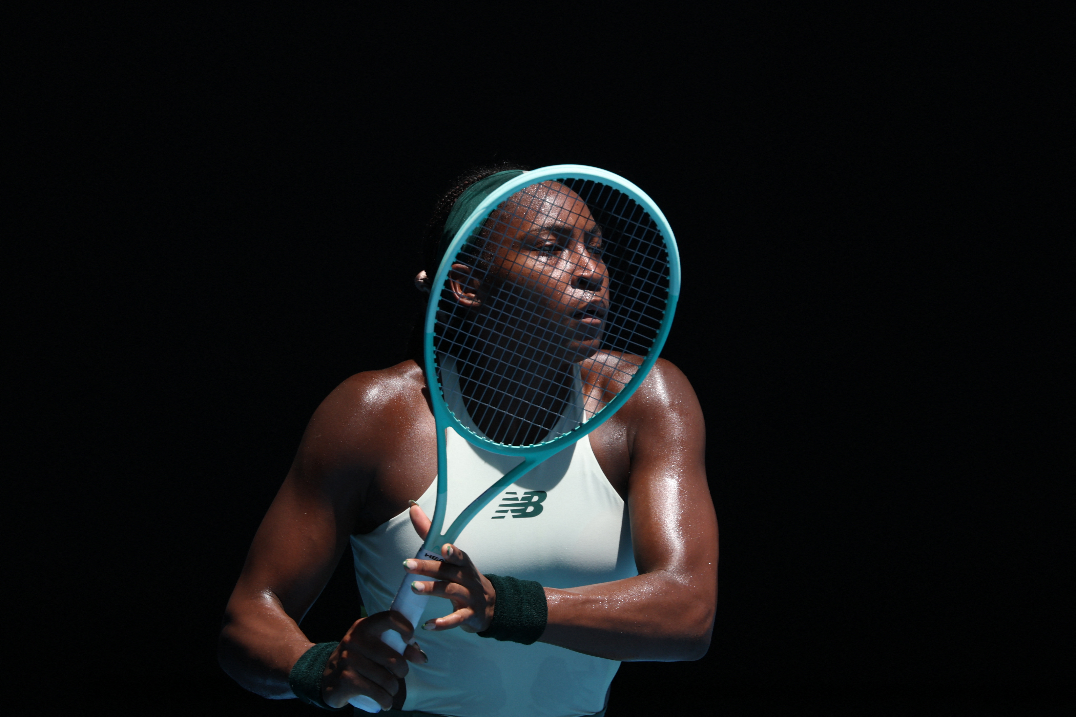 USA's Coco Gauff reacts after a point against Spain's Paula Badosa during their women's singles match on day ten of the Australian Open tennis tournament in Melbourne on January 21, 2025. (Photo by DAVID GRAY / AFP) / -- IMAGE RESTRICTED TO EDITORIAL USE - STRICTLY NO COMMERCIAL USE --