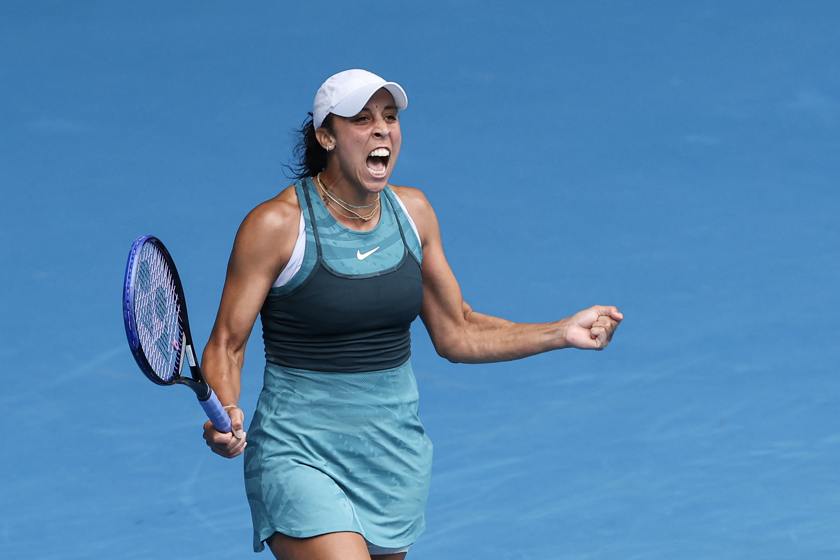 USA's Madison Keys celebrates match point against Ukraine's Elina Svitolina during their women's singles quarter-final match on day eleven of the Australian Open tennis tournament in Melbourne on January 22, 2025. (Photo by Martin KEEP / AFP) / -- IMAGE RESTRICTED TO EDITORIAL USE - STRICTLY NO COMMERCIAL USE --