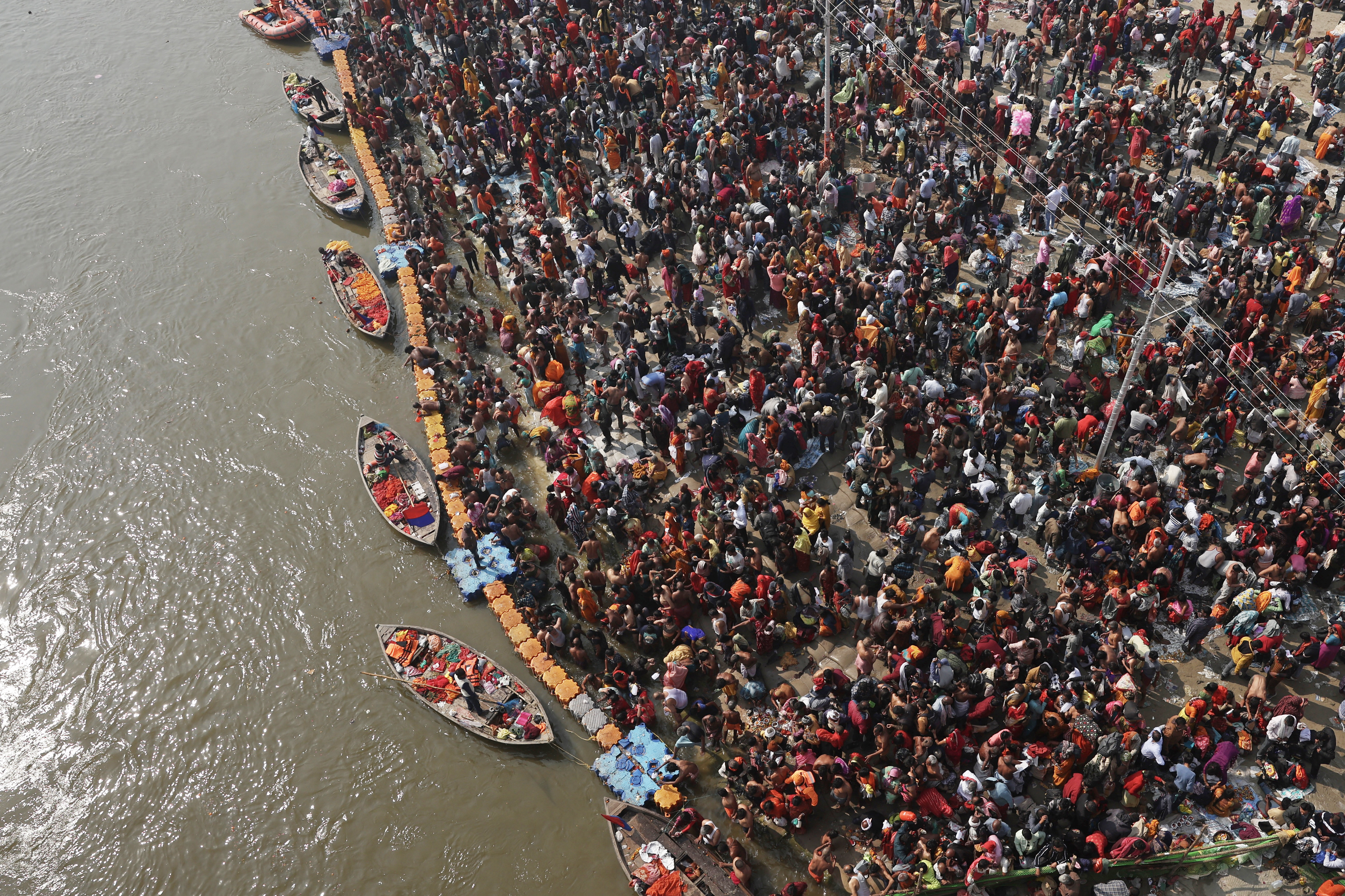 3 Millions of Hindus take 'holy dip' a day after fatal stampede