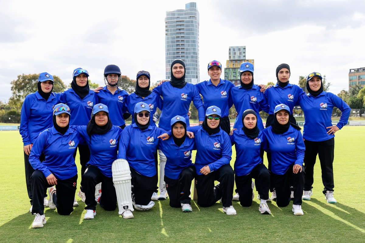 Afghanistan Women's XI players pose for a team photo.