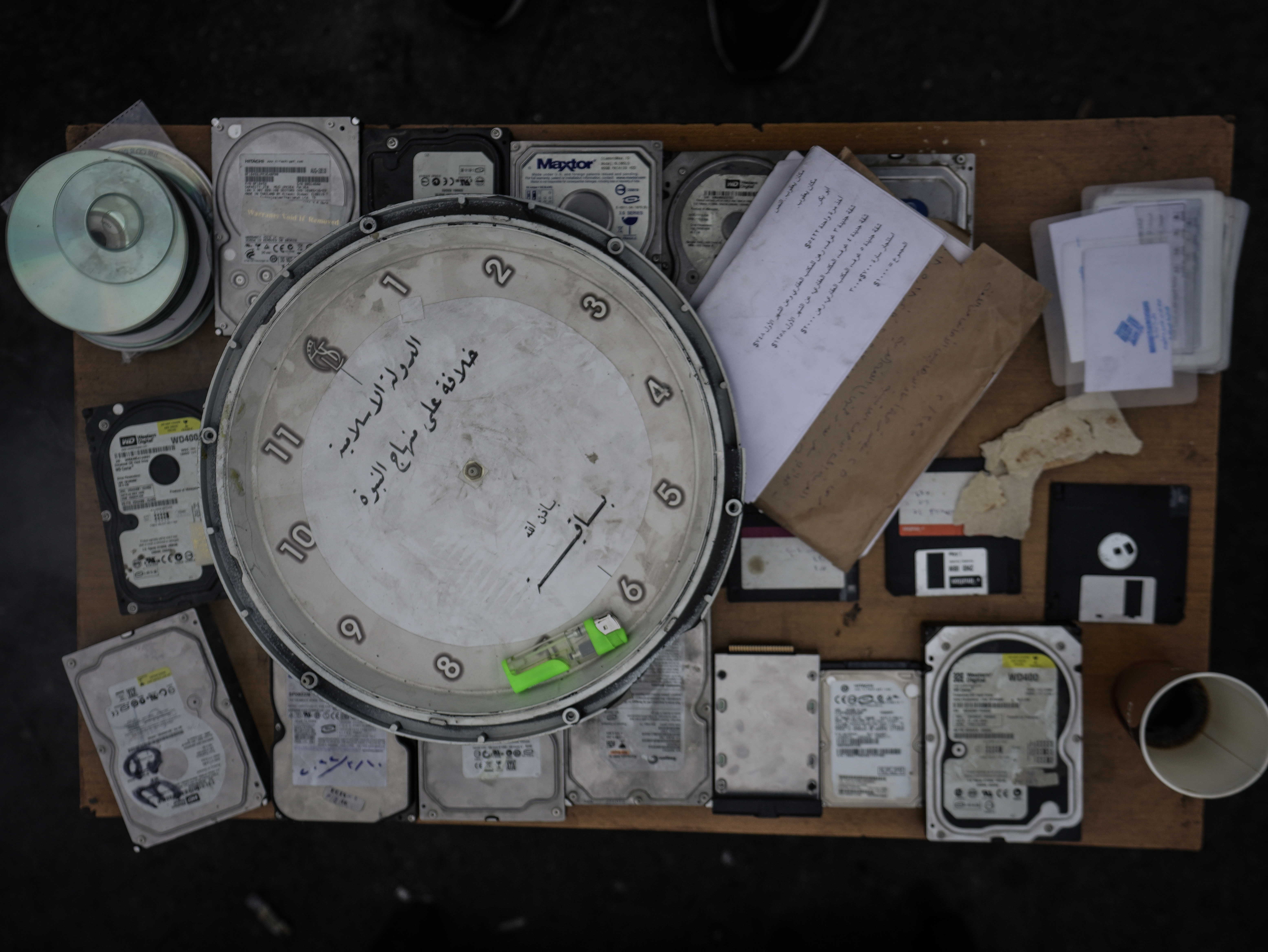 Electronic storage devices and waste found in the Palestine Branch, some of which belong to ISIS