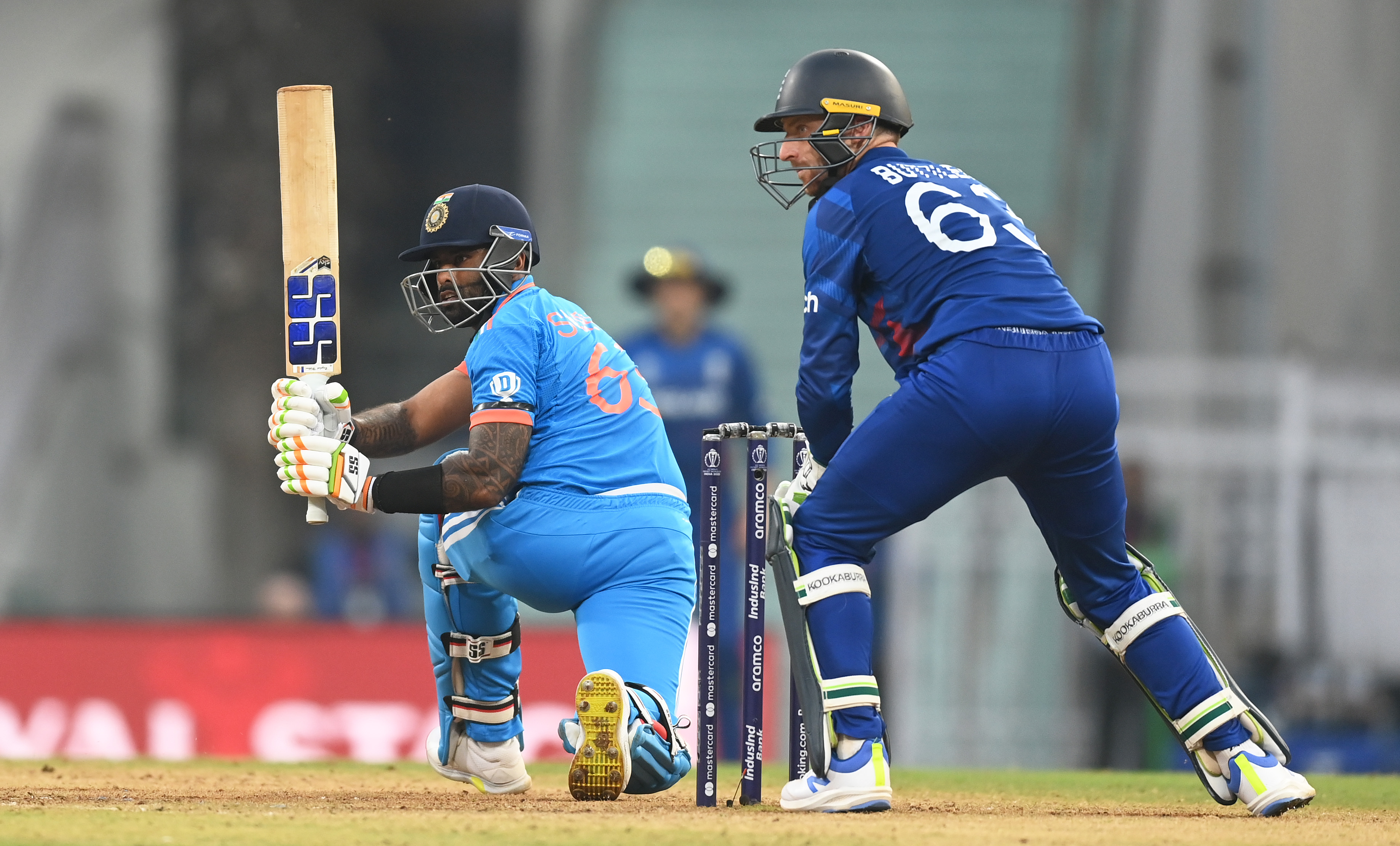 India batsman plays stroke.