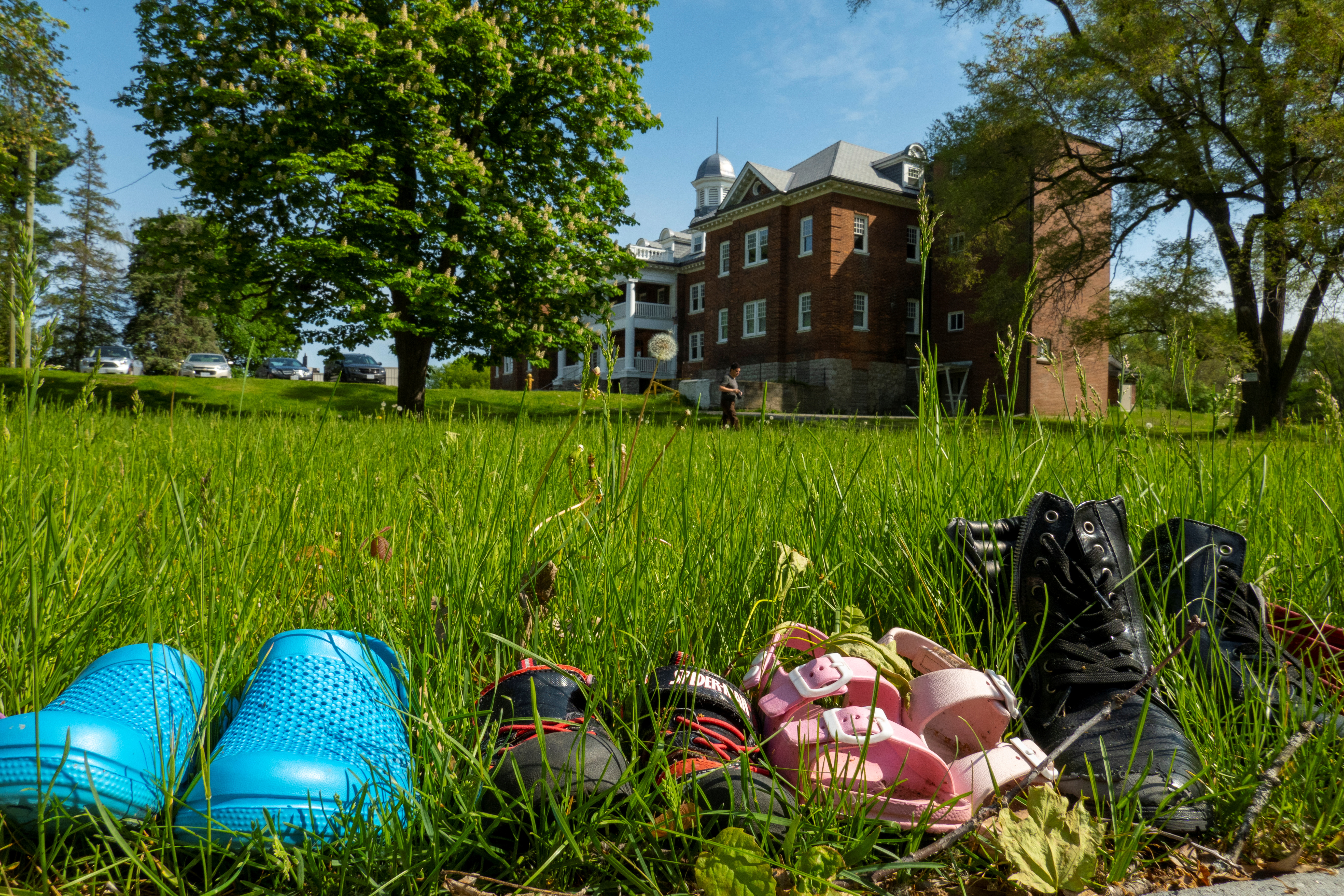 Children's shoes are pictured outside the Mohawk Institute, a residential school in Ontario