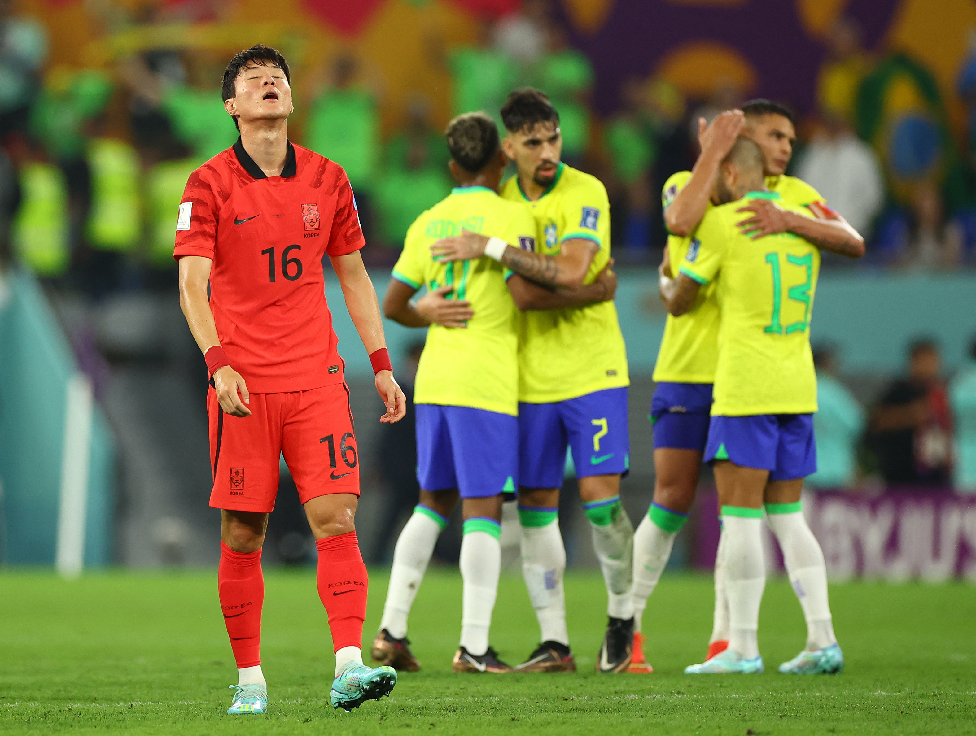 Soccer Football - FIFA World Cup Qatar 2022 - Round of 16 - Brazil v South Korea - Stadium 974, Doha, Qatar - December 5, 2022 South Korea's Hwang Ui-jo looks dejected after being eliminated from the World Cup REUTERS/Kim Hong-Ji