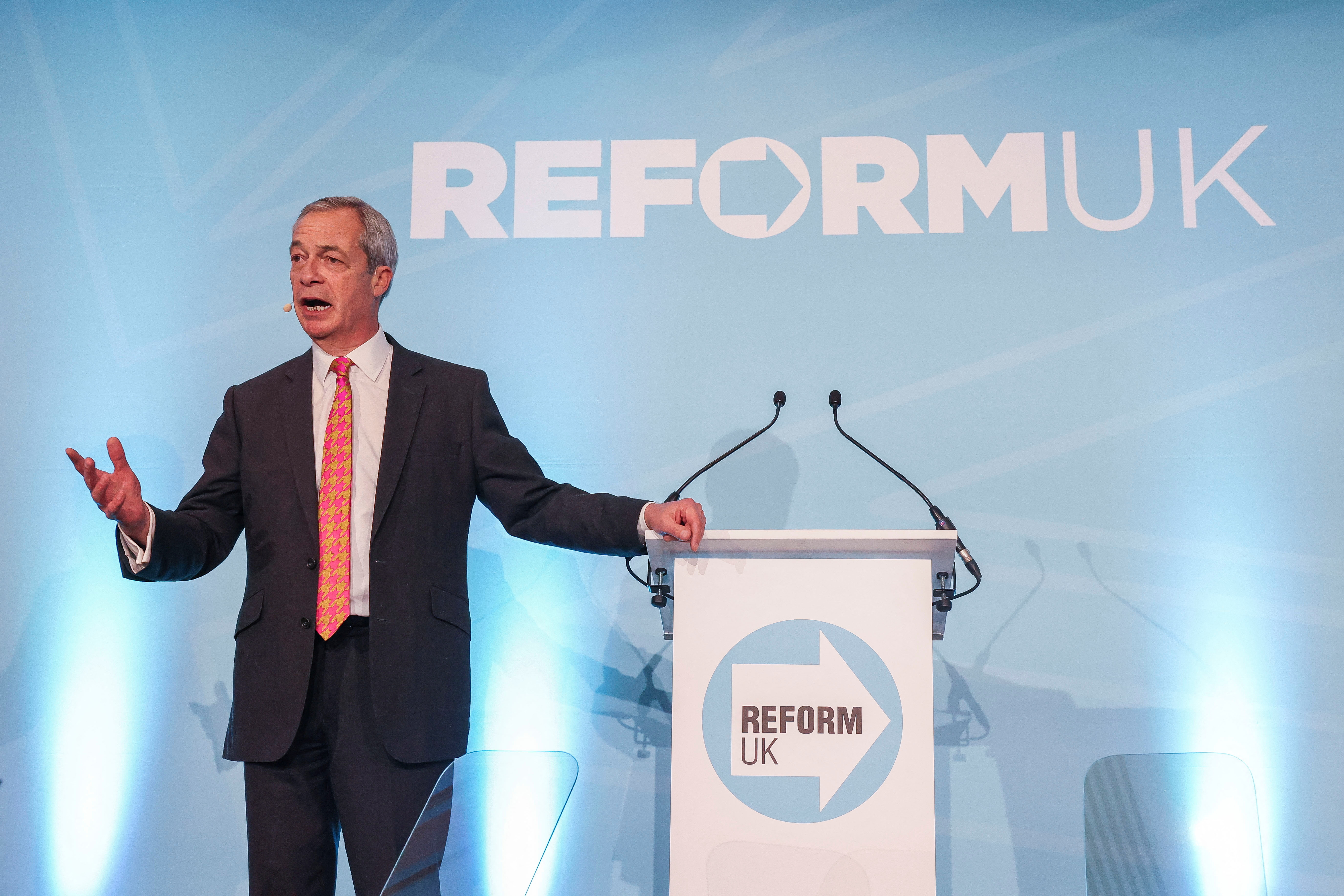 Britain's Reform UK party leader Nigel Farage gestures, during a conference in Chester, Britain January 11, 2025. REUTERS/Temilade Adelaja