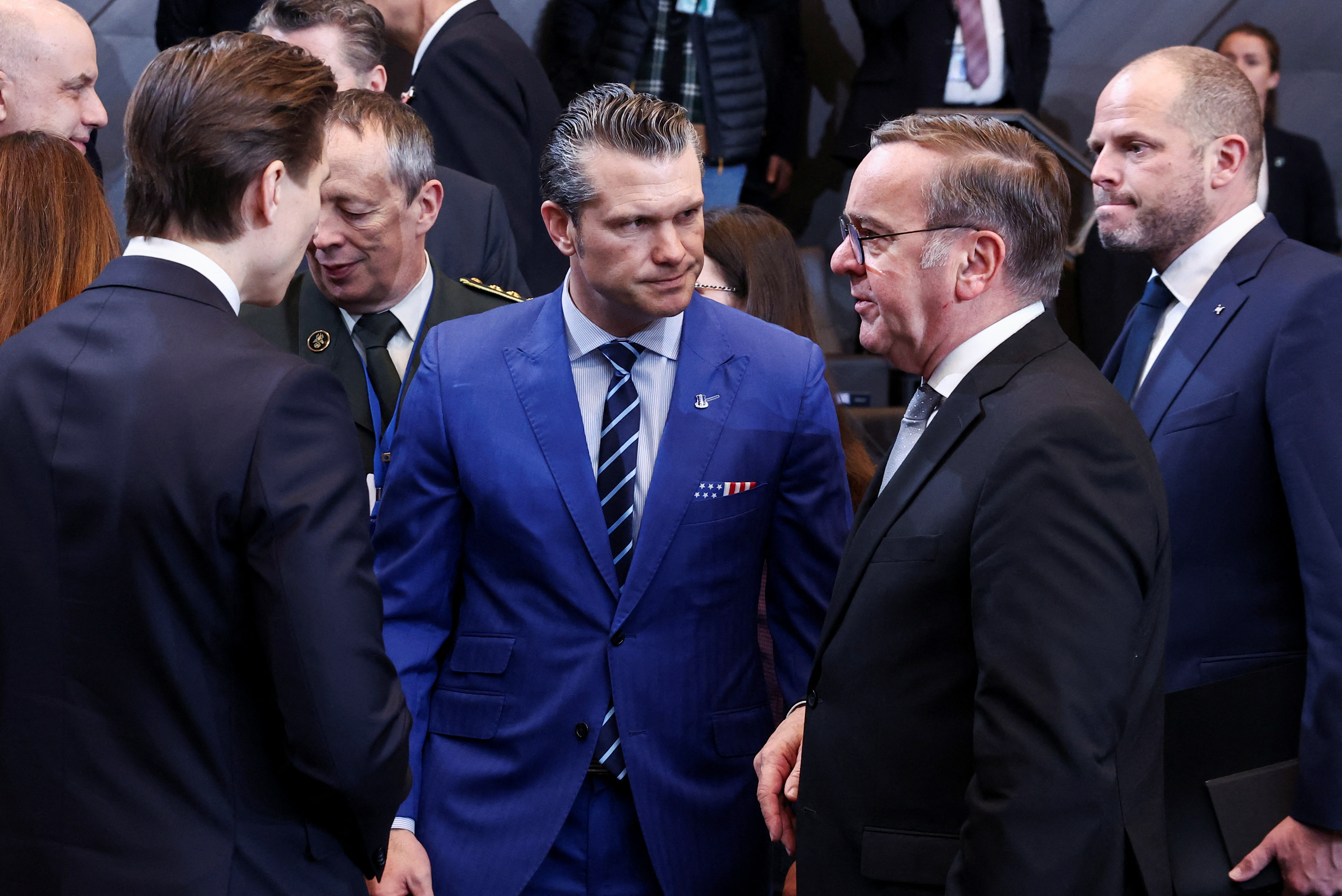 US Defense Secretary Pete Hegseth, Belgium's Defence Minister Theo Francken, Finland's Defence Minister Antti Hakkanen and Germany's Defence Minister Boris Pistorius attend a meeting.