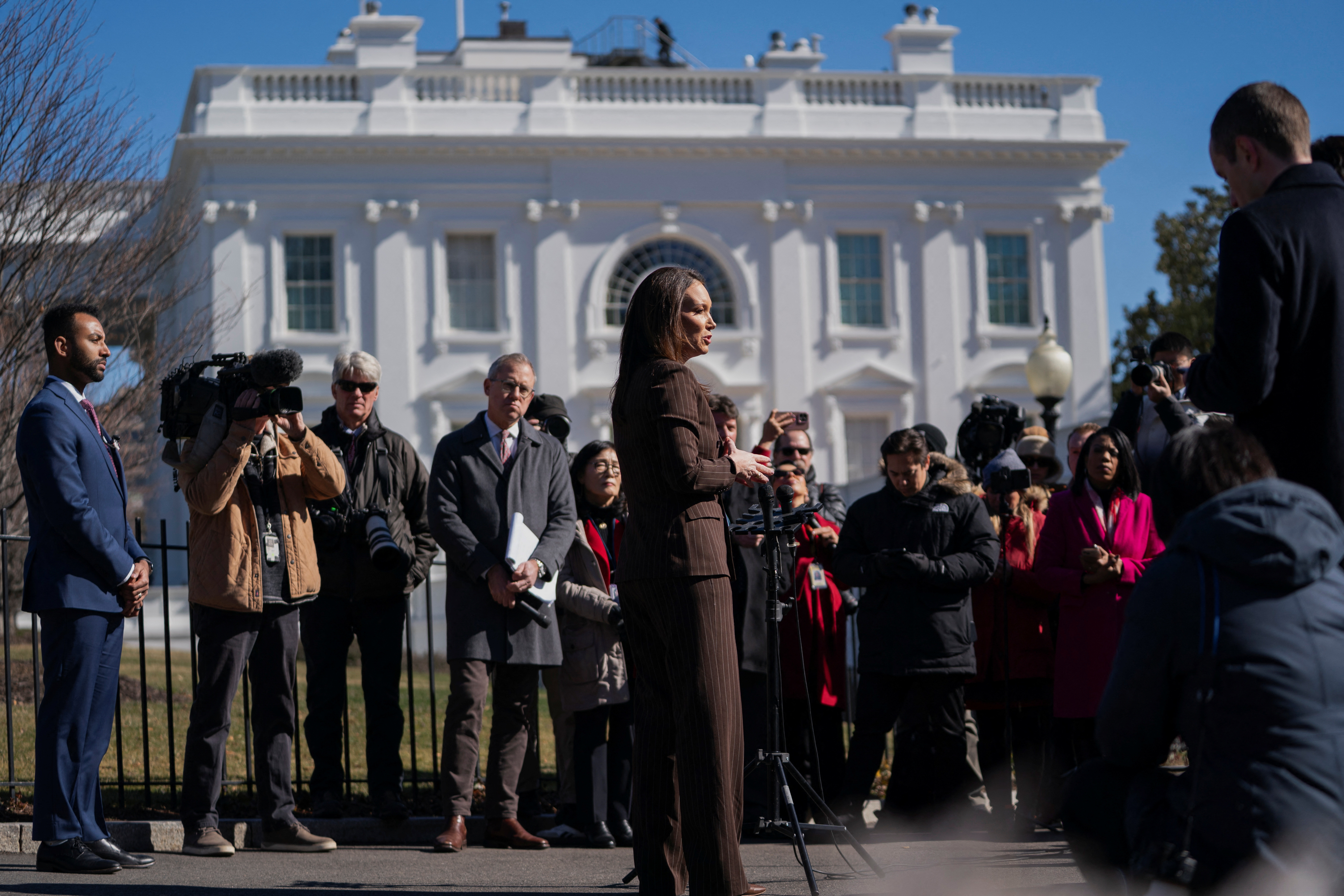U.S. Secretary of Agriculture Brooke Rollins speaks with members of the media outside the White House in Washington, D.C., U.S., February 14, 2025. REUTERS/Nathan Howard
