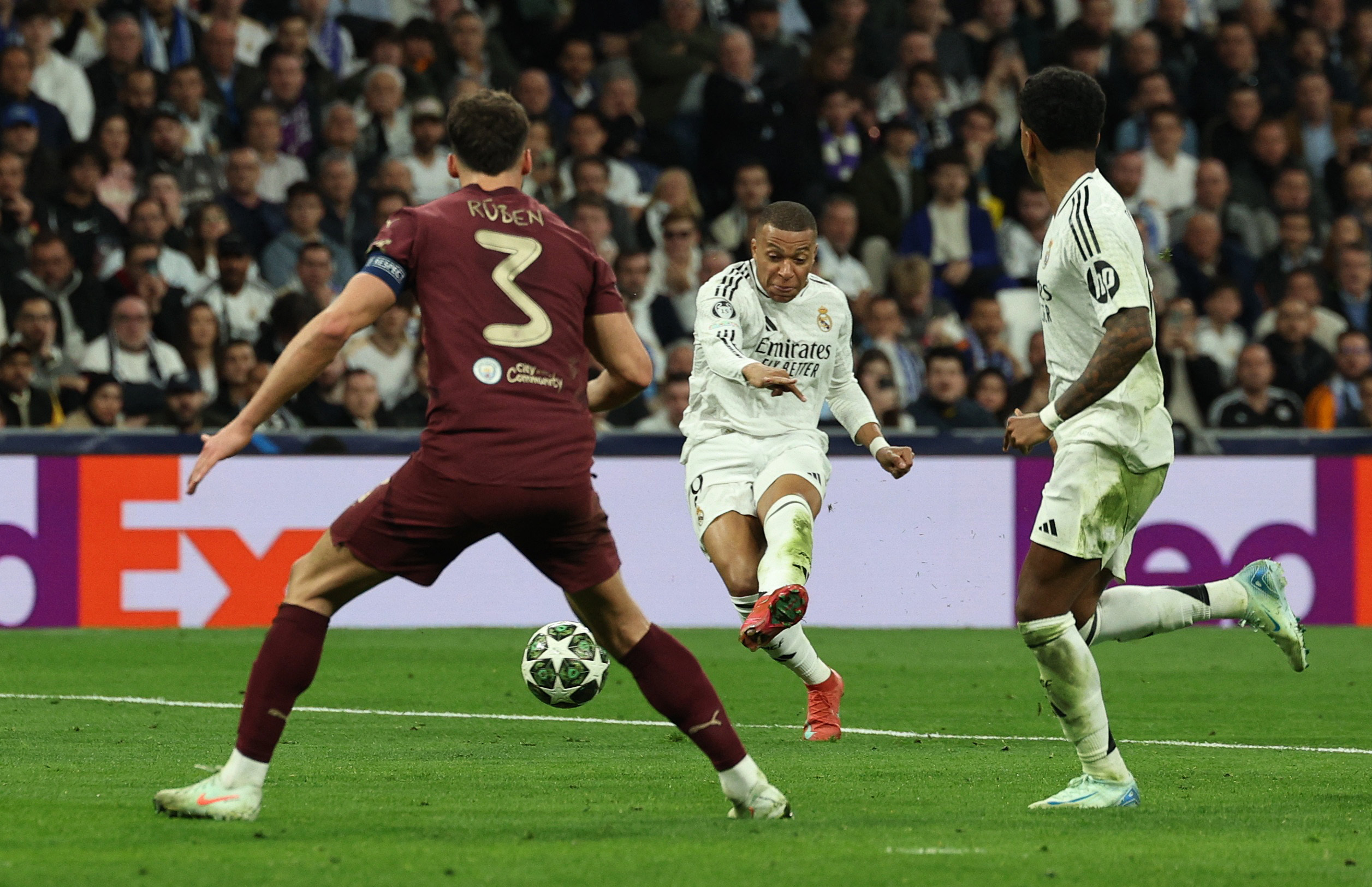 Real Madrid's Kylian Mbappe scores their third goal to complete a hat-trick