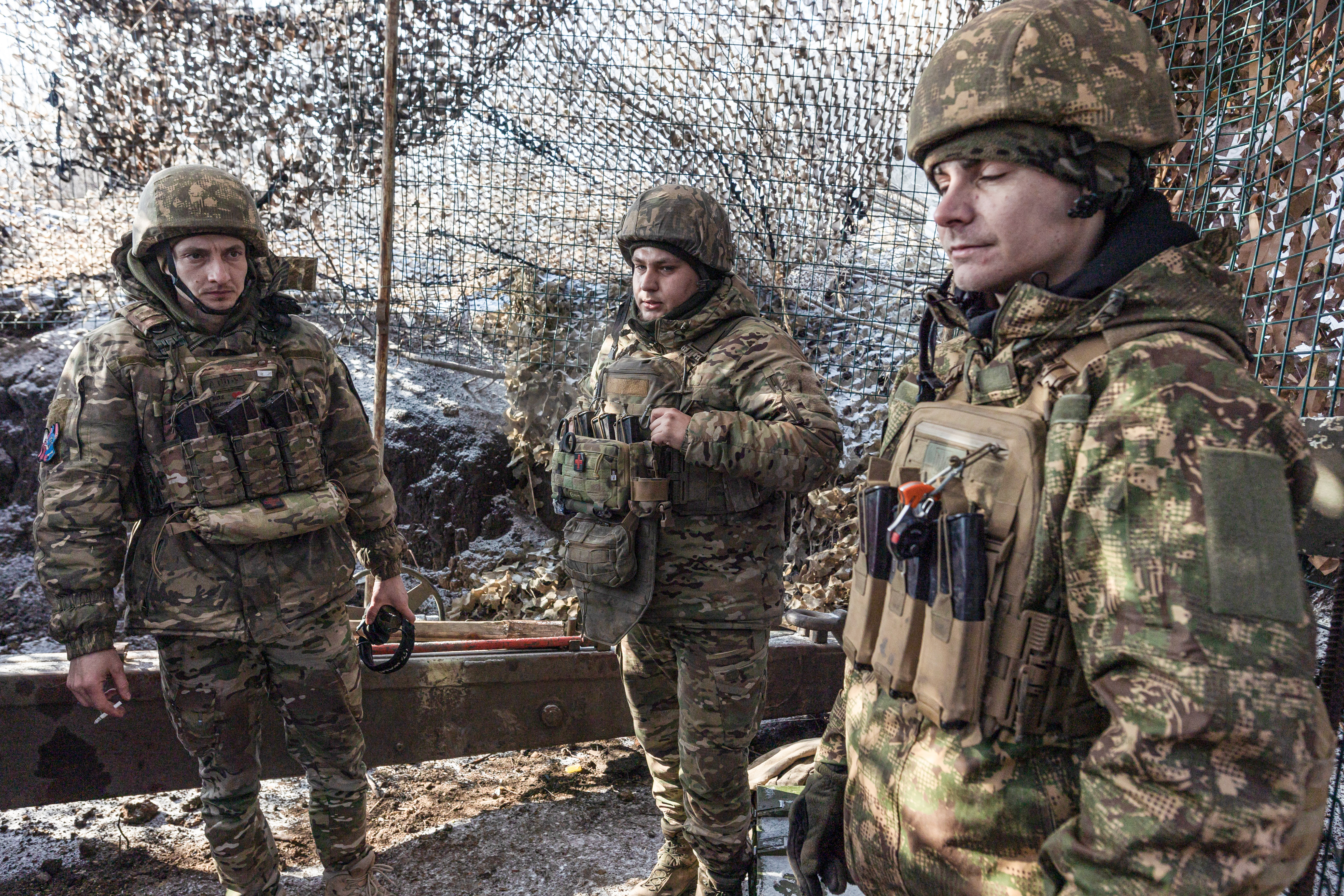 Ukrainian national guard soldiers wait for firing orders for Soviet D-20 artillery in the direction of Pokrovsk, Ukraine on February