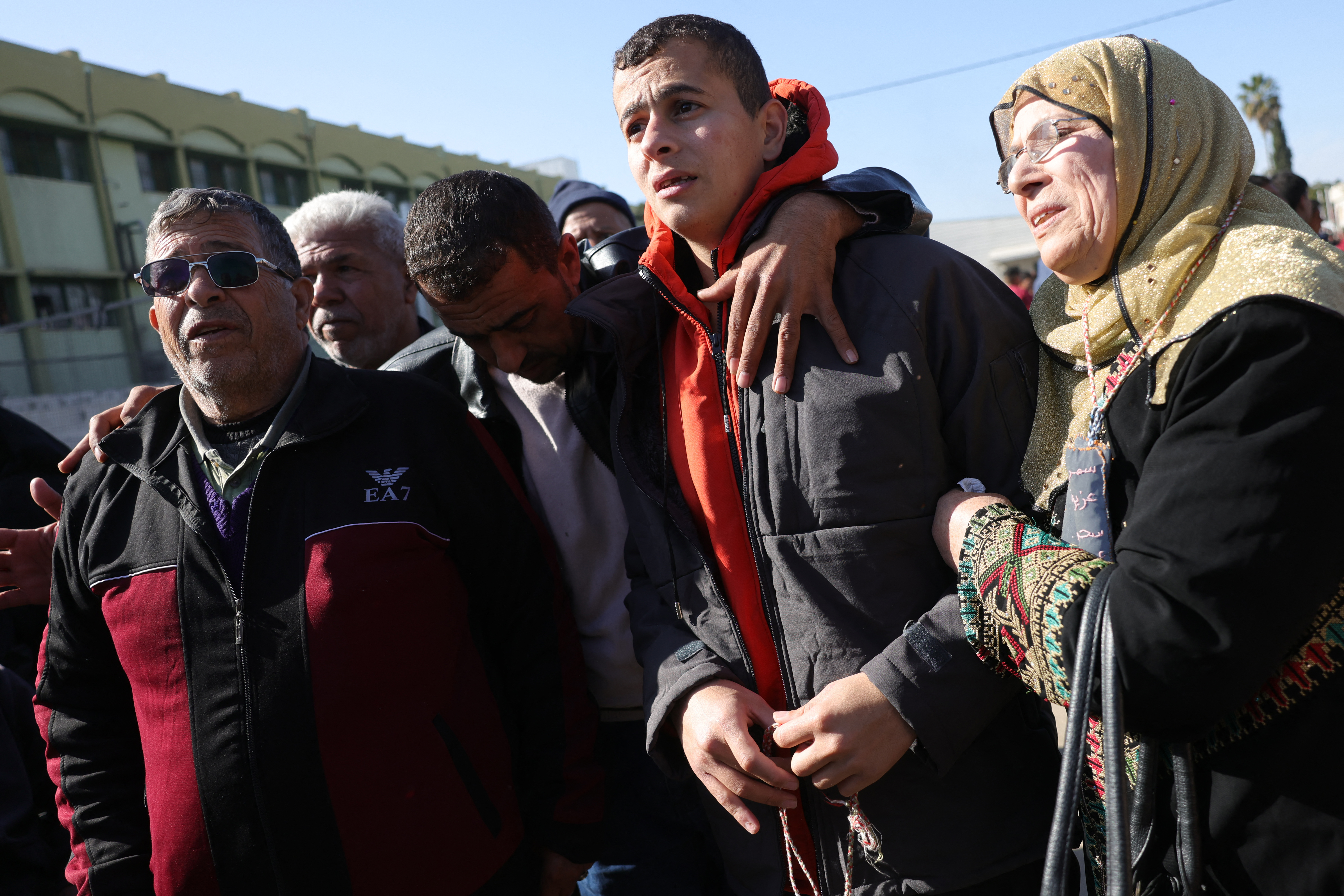A former Palestinian prisoner, released as part of the sixth hostage-prisoner exchange, is welcomed by friends and relatives upon arriving at the European Hospital in Khan Yunis in the southern Gaza Strip