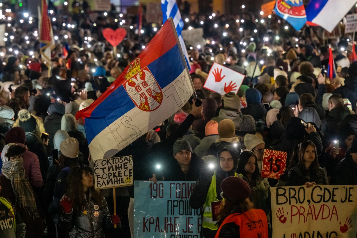 People demonstrate at the main boulevard in the central Serbian city of Kragujevac