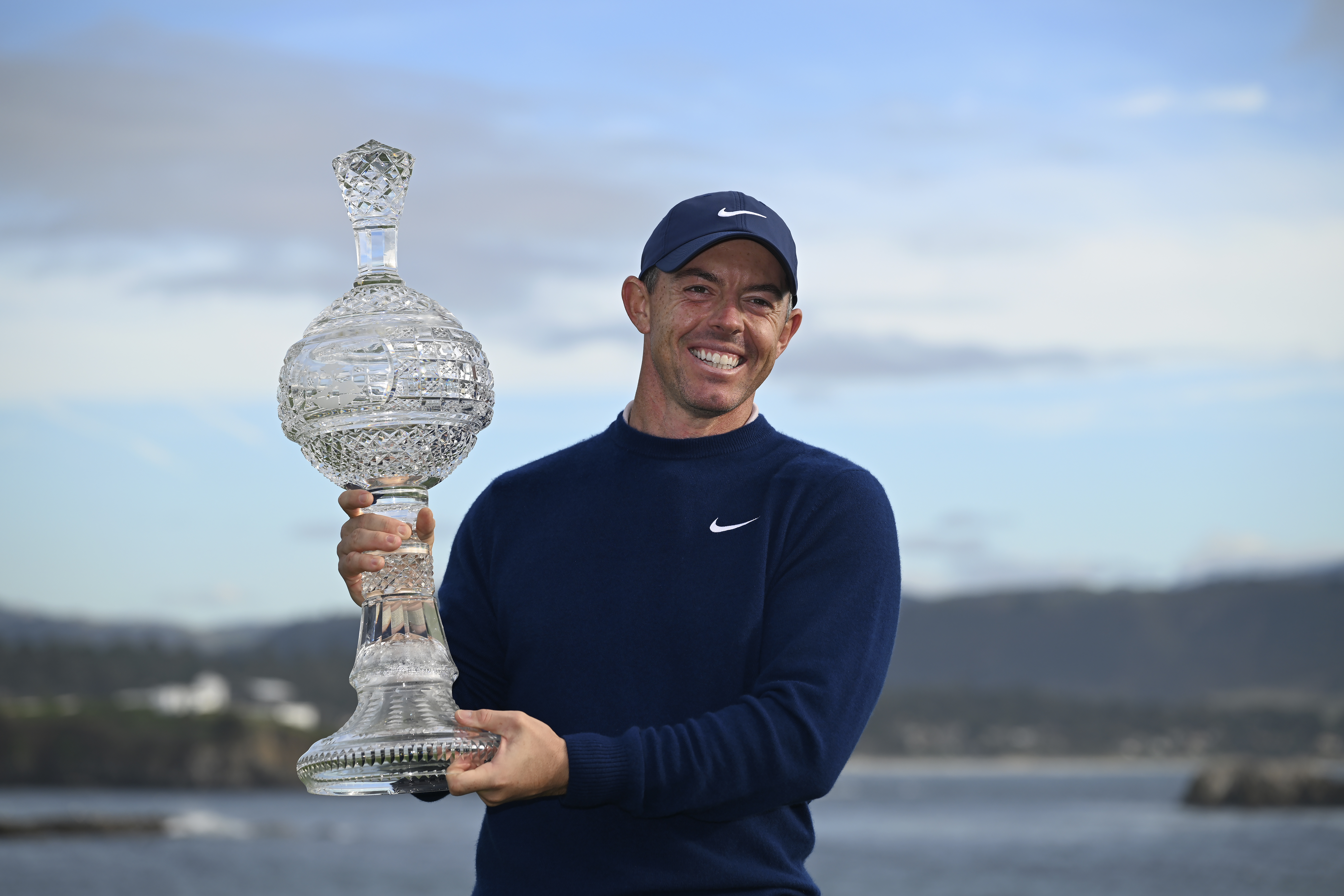 Rory McIlroy, of Northern Ireland, celebrates at Pebble Beach Golf Links after winning the AT&T Pebble Beach Pro-Am golf tournament, Sunday, Feb. 2, 2025, in Pebble Beach, Calif. (AP Photo/Nic Coury)