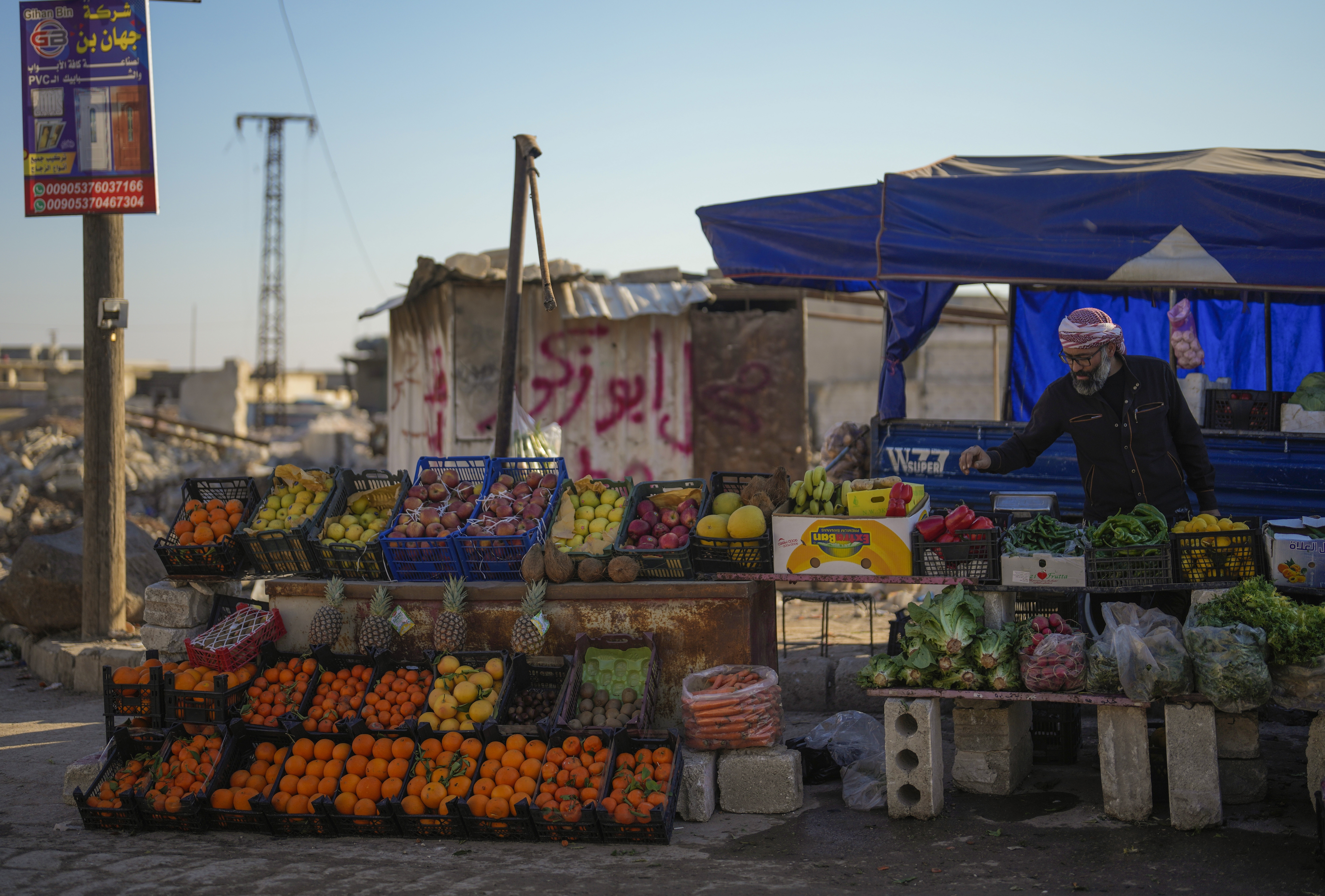 Syrians returning to the town of Tel Rifaat find homes in ruins and underground tunnels