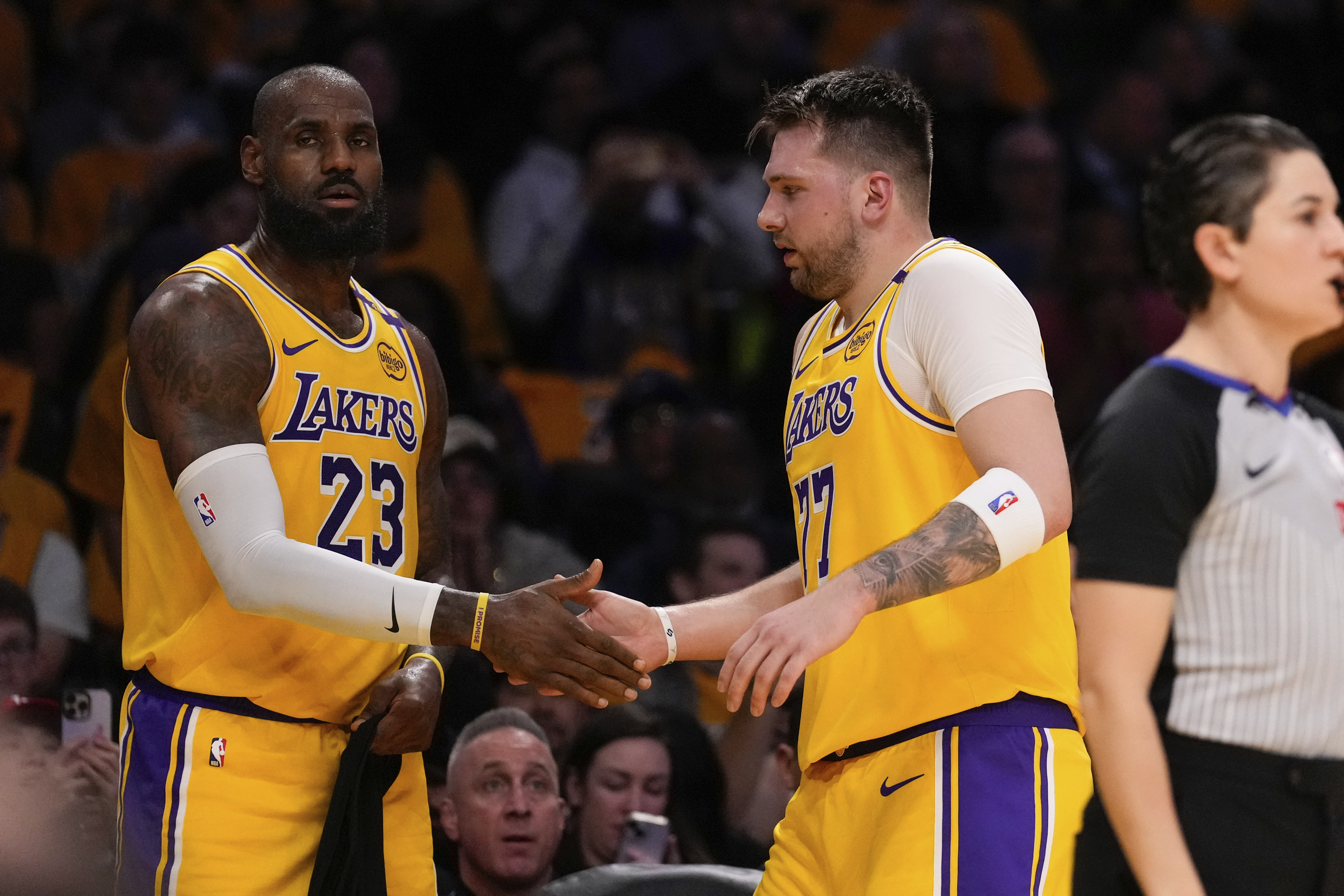 Luka Doncic and LeBron James on court.