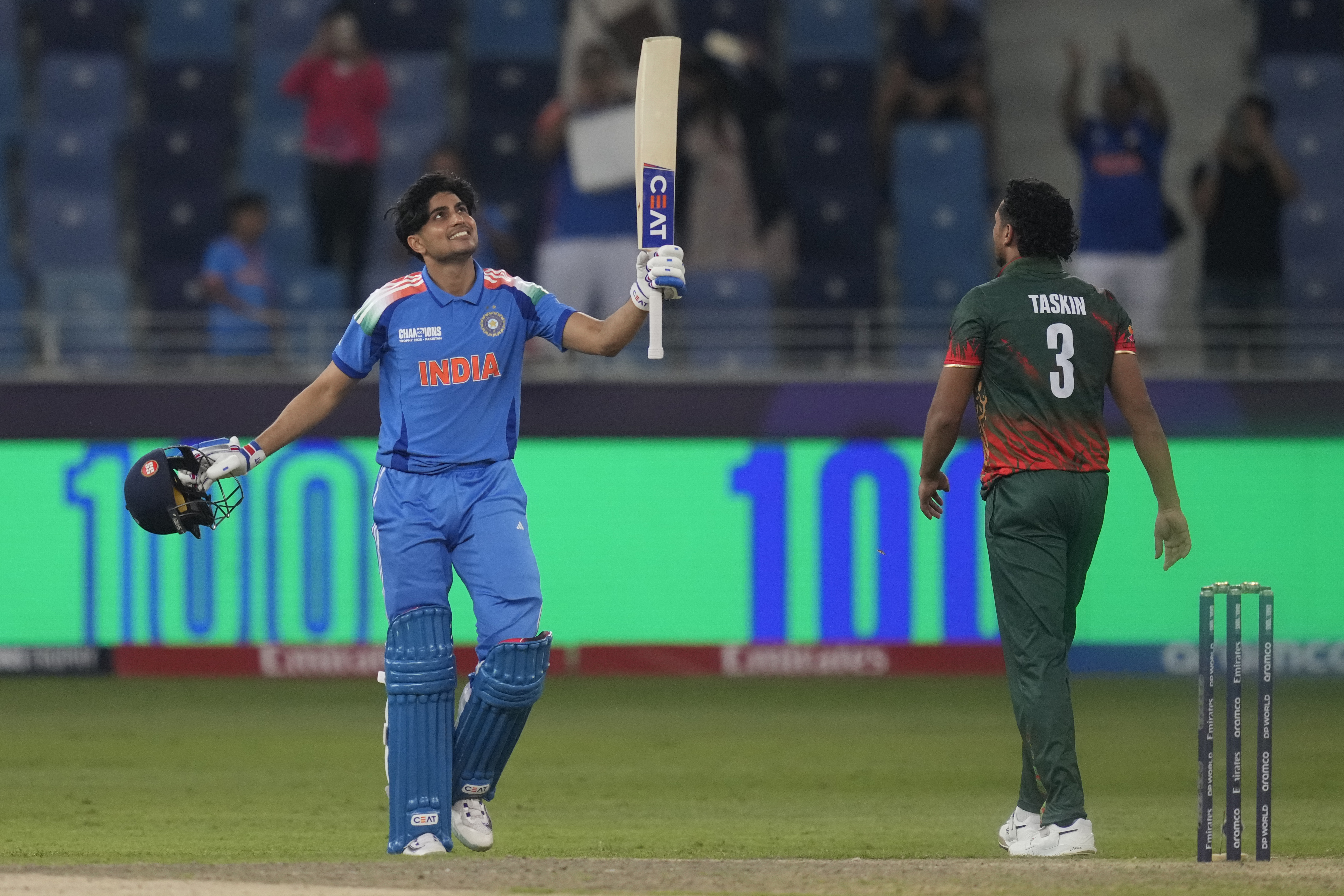India's Shubman Gill celebrates after scoring a century during the ICC Champions Trophy cricket match between India and Bangladesh at Dubai International Cricket Stadium in Dubai, United Arab Emirates, Thursday, Feb. 20, 2025. (AP Photo/Altaf Qadri)
