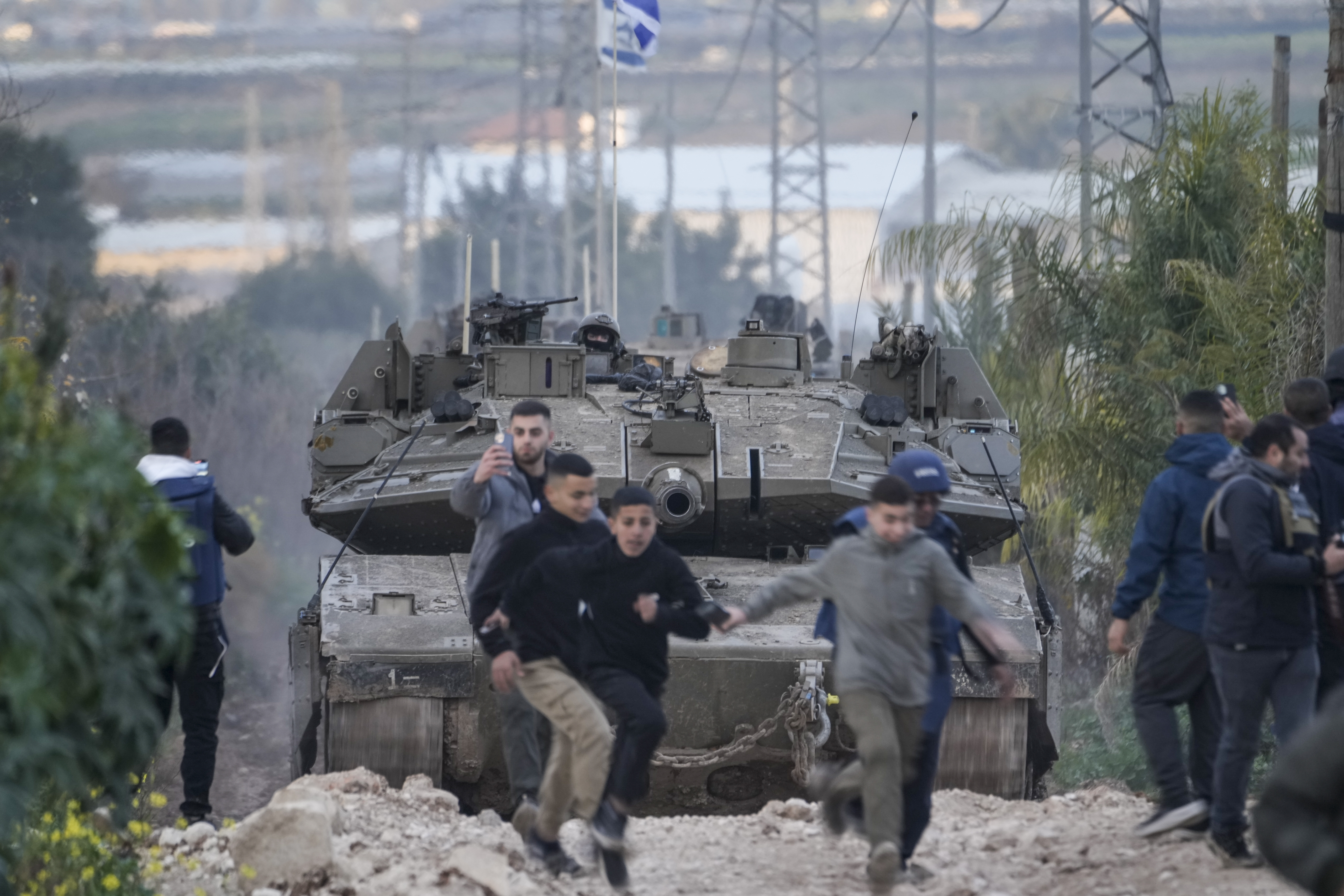 Israeli tanks drive towards the occupied West Bank of Jenin camp