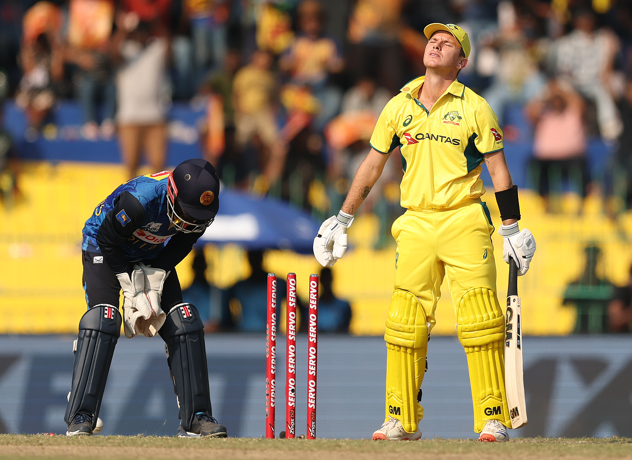 COLOMBO, SRI LANKA - FEBRUARY 14: Adam Zampa of Australia is bowld by Dunith Wellalage of Sri Lanka during the ODI match between Sri Lanka and Australia at R. Premadasa Stadium on February 14, 2025 in Colombo, Sri Lanka. (Photo by Robert Cianflone/Getty Images)