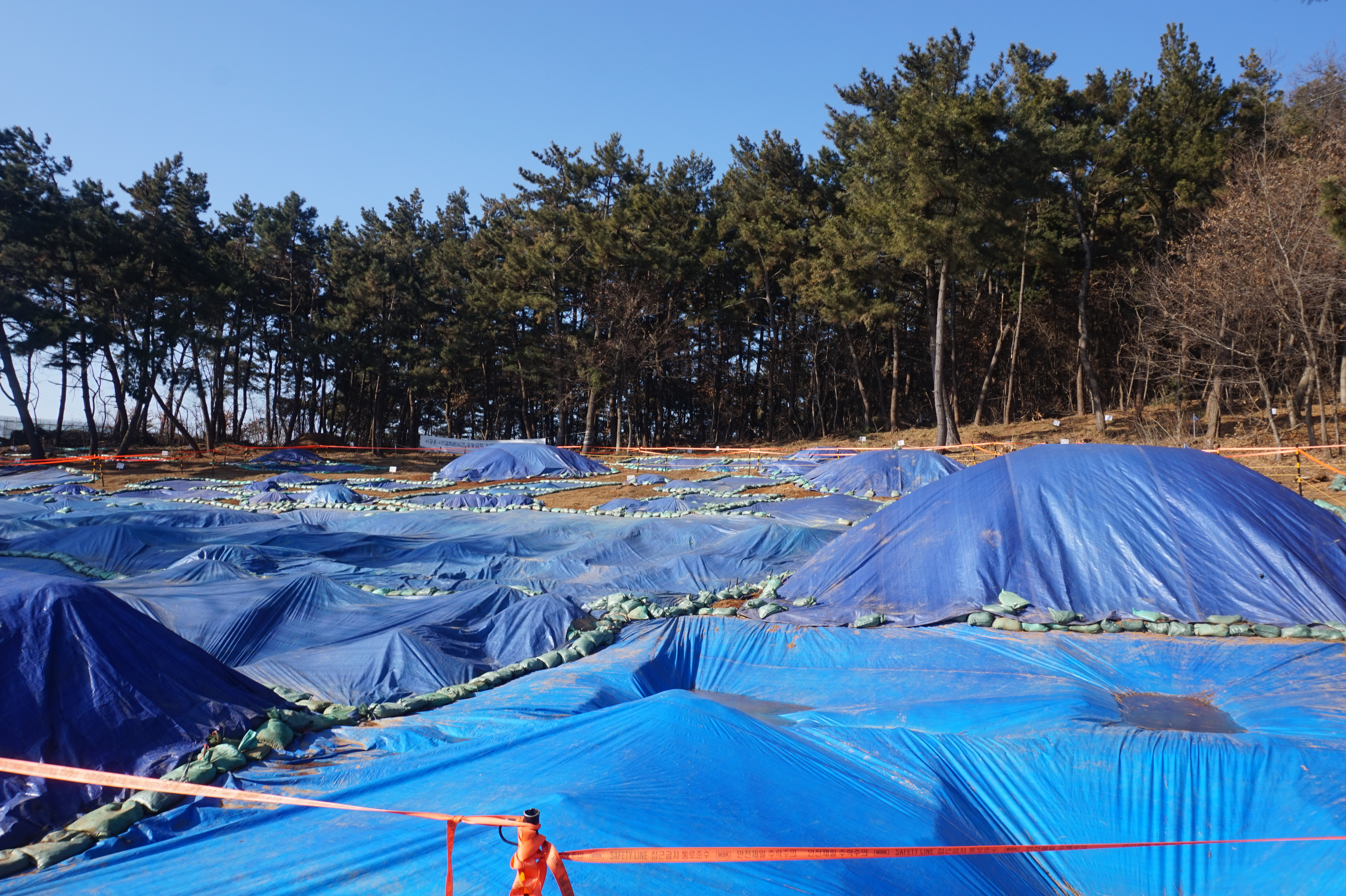 The forest excavation site where a truth commission is searching for the bodies of Soen-gam Academy inmates who were secretly buried here [David Lee/Al Jazeera]