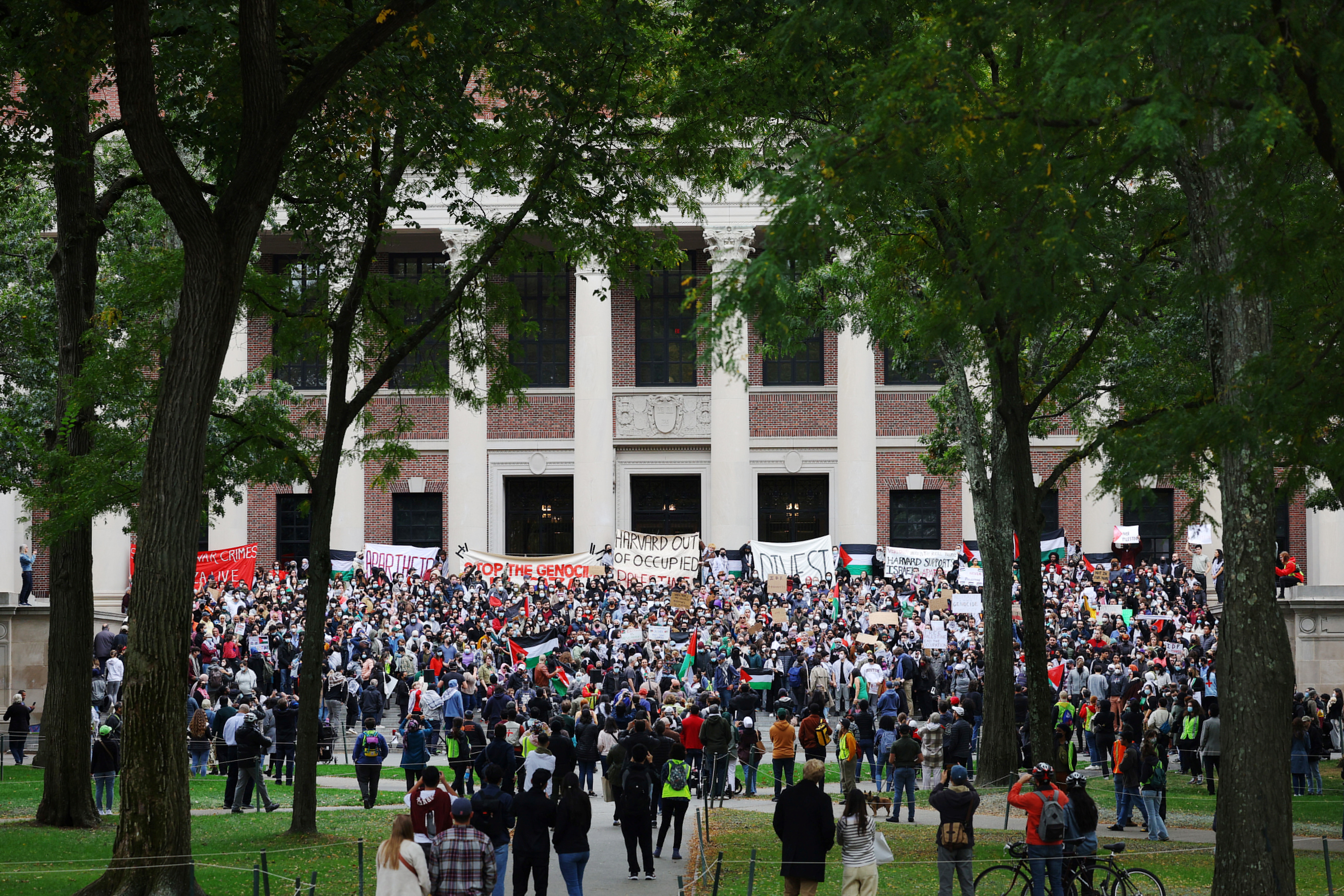 Demonstrators take part in a protest at a university.