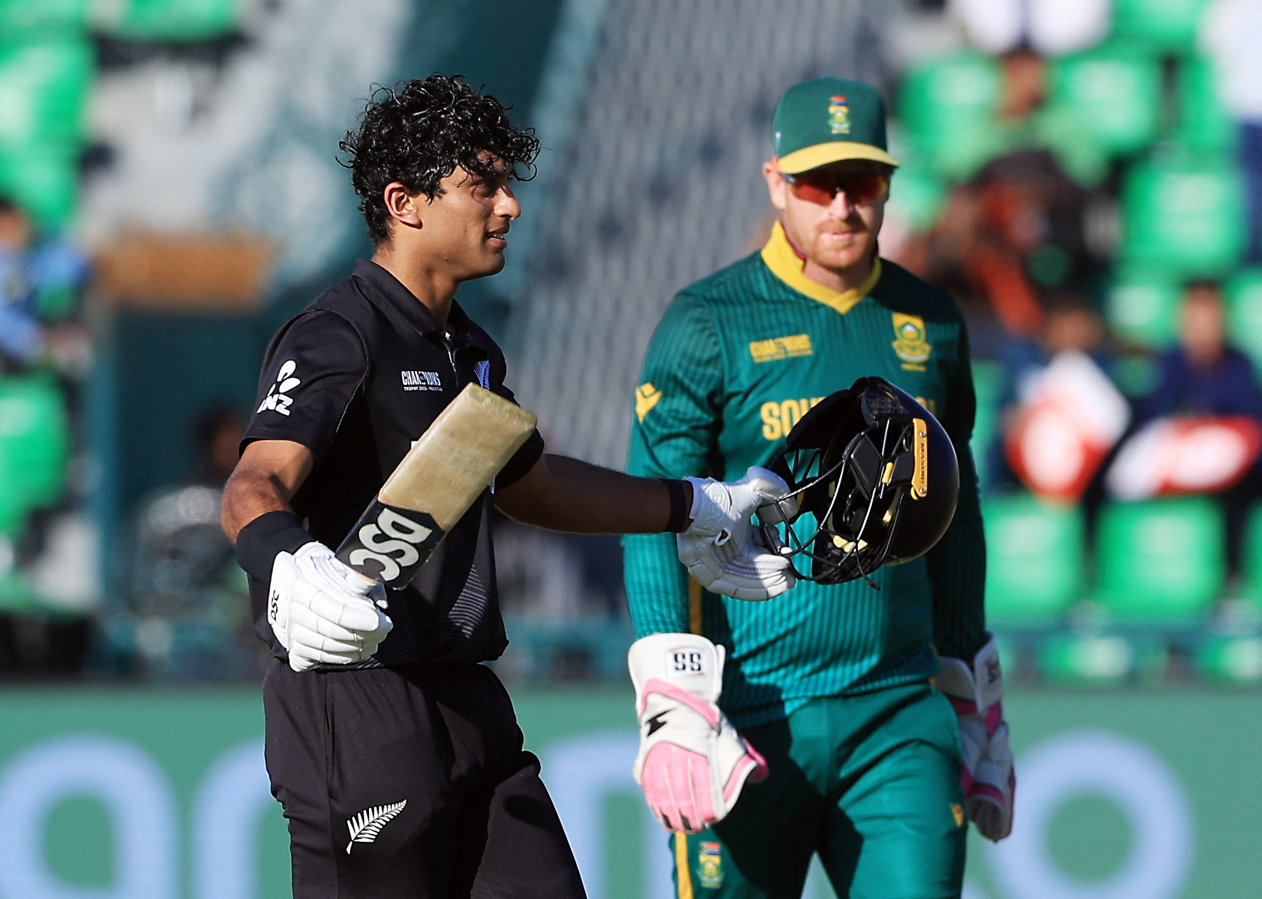 Cricket - ICC Men's Champions Trophy - Semi Final - South Africa v New Zealand - Gaddafi Stadium, Lahore, Pakistan - March 5, 2025 New Zealand's Rachin Ravindra celebrates after reaching his century REUTERS/Akhtar Soomro