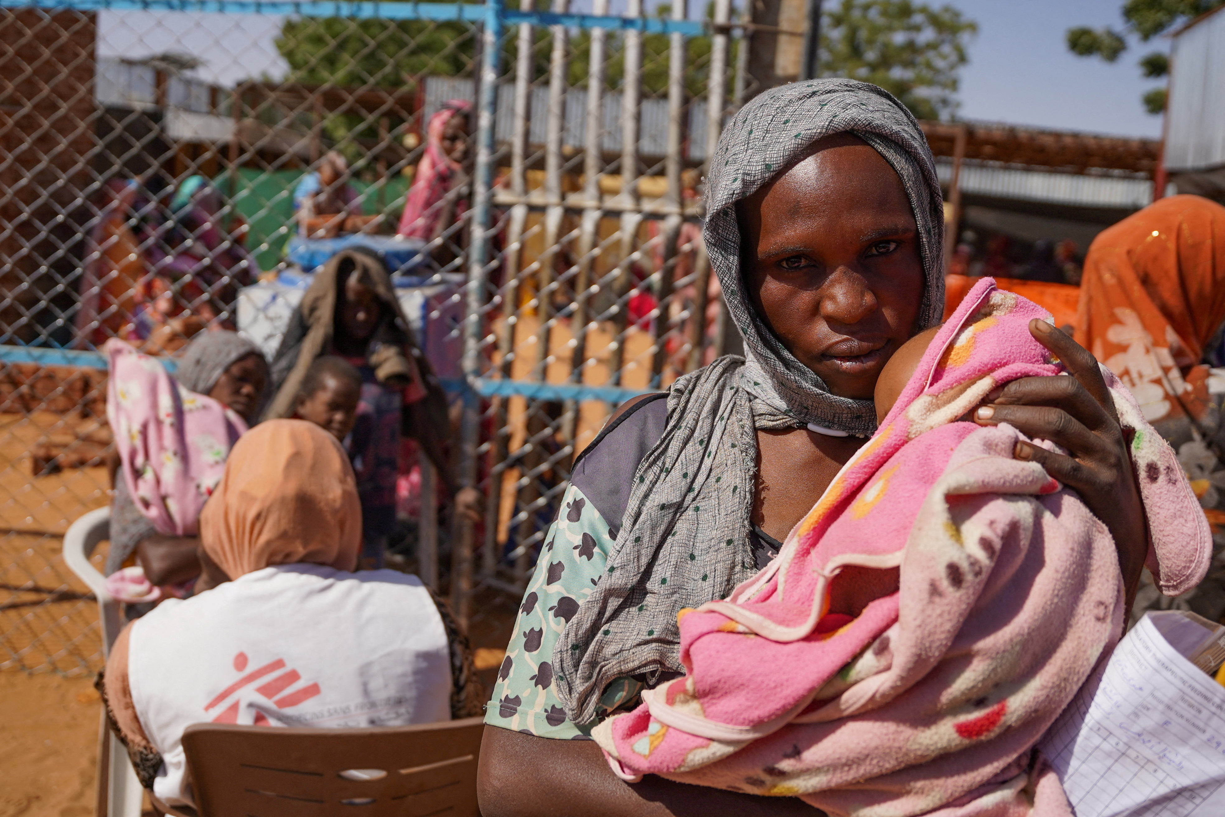 A woman and baby at the Zamzam displacement camp, close to El Fasher in North Darfur, Sudan