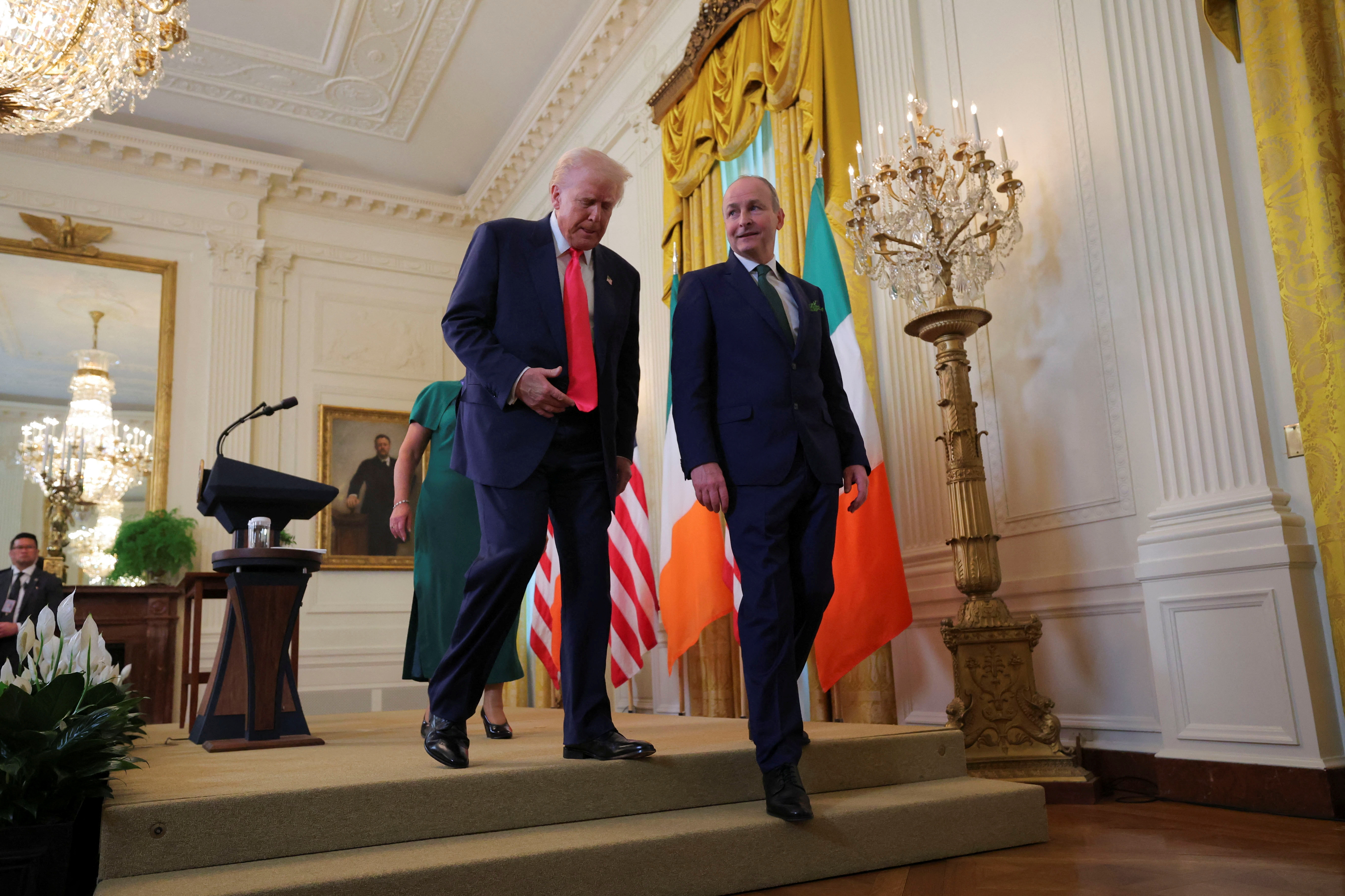 Trump and Michael Martin walk off stage