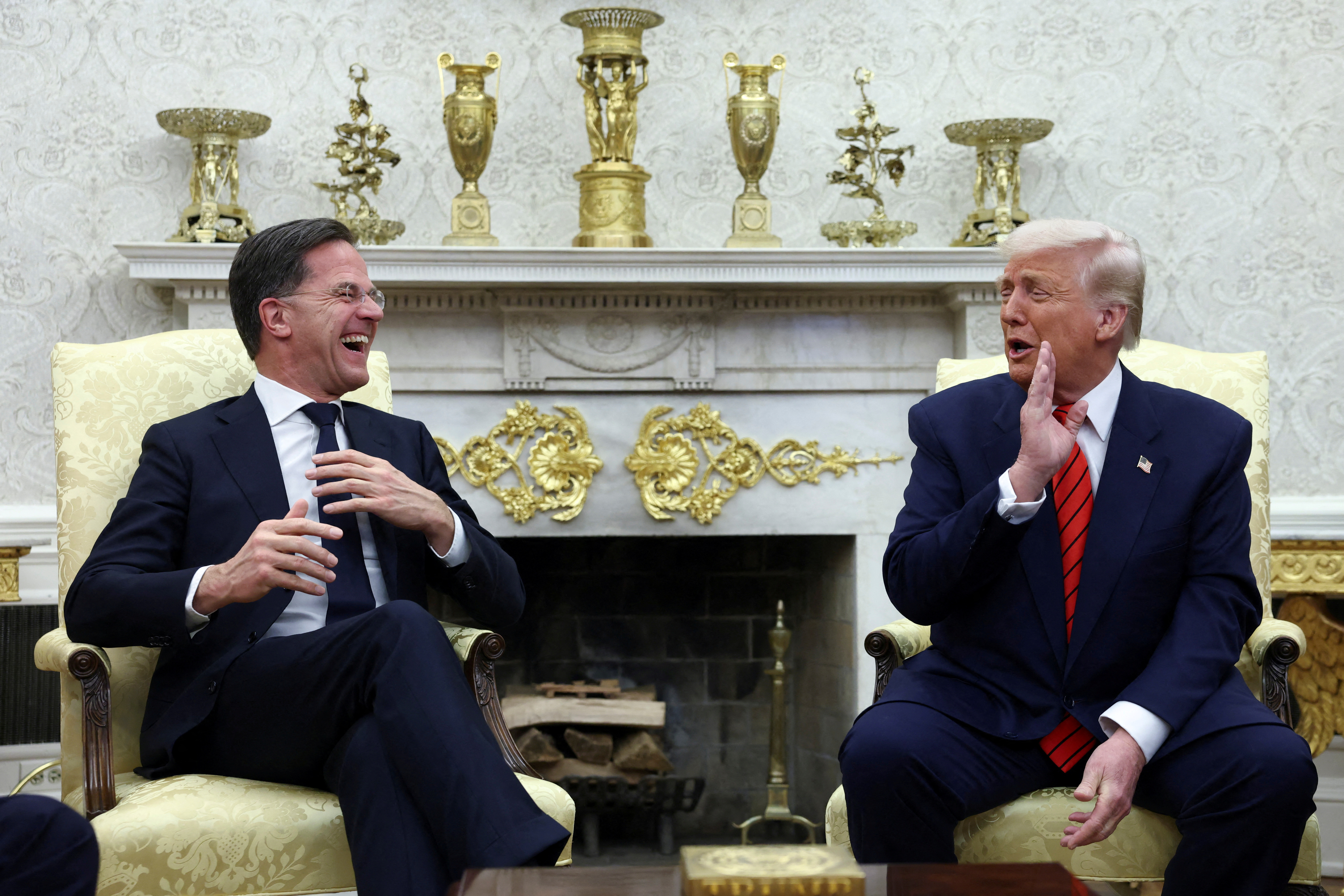 U.S. President Donald Trump meets NATO Secretary General Mark Rutte, in the Oval Office at the White House in Washington, D.C., U.S., March 13, 2025. REUTERS/Evelyn Hockstein