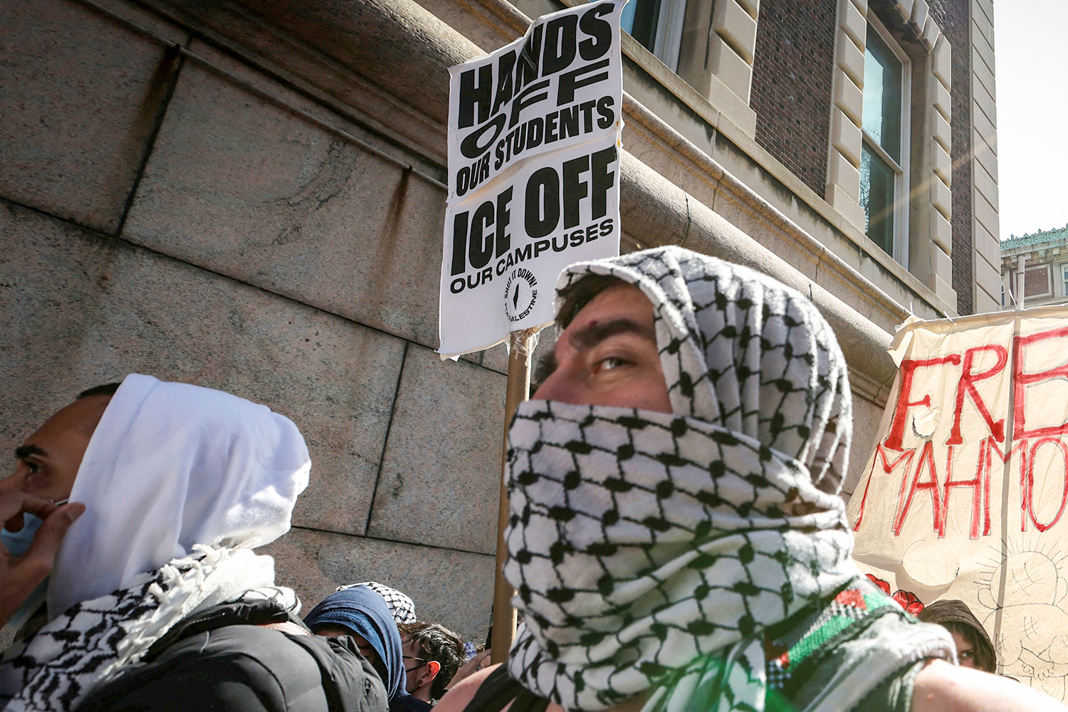Muslims and others demonstrate outside the main campus of Columbia University
