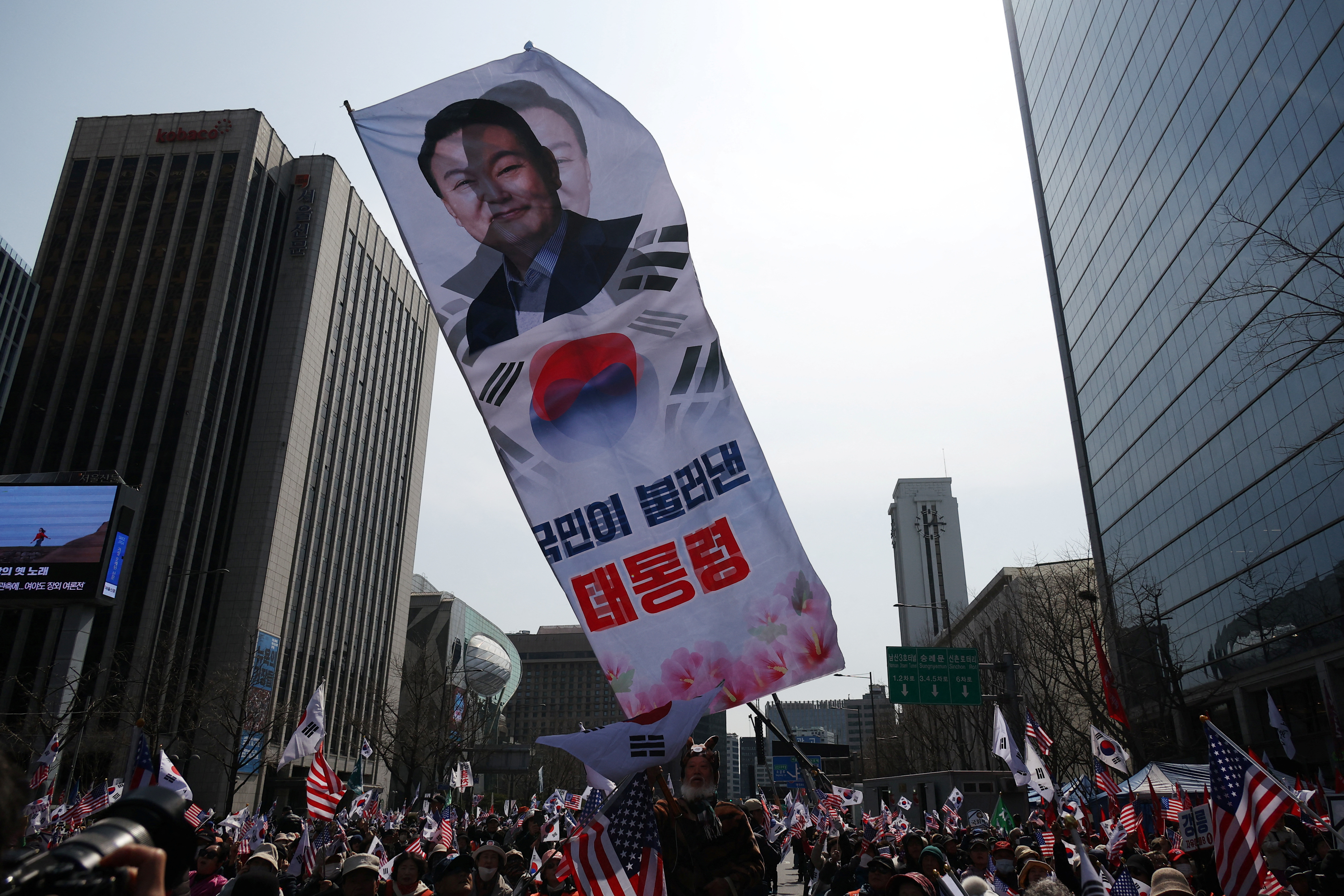 Far-right protesters attend a rally to support impeached South Korean President Yoon Suk Yeol in central Seoul, South Korea, 