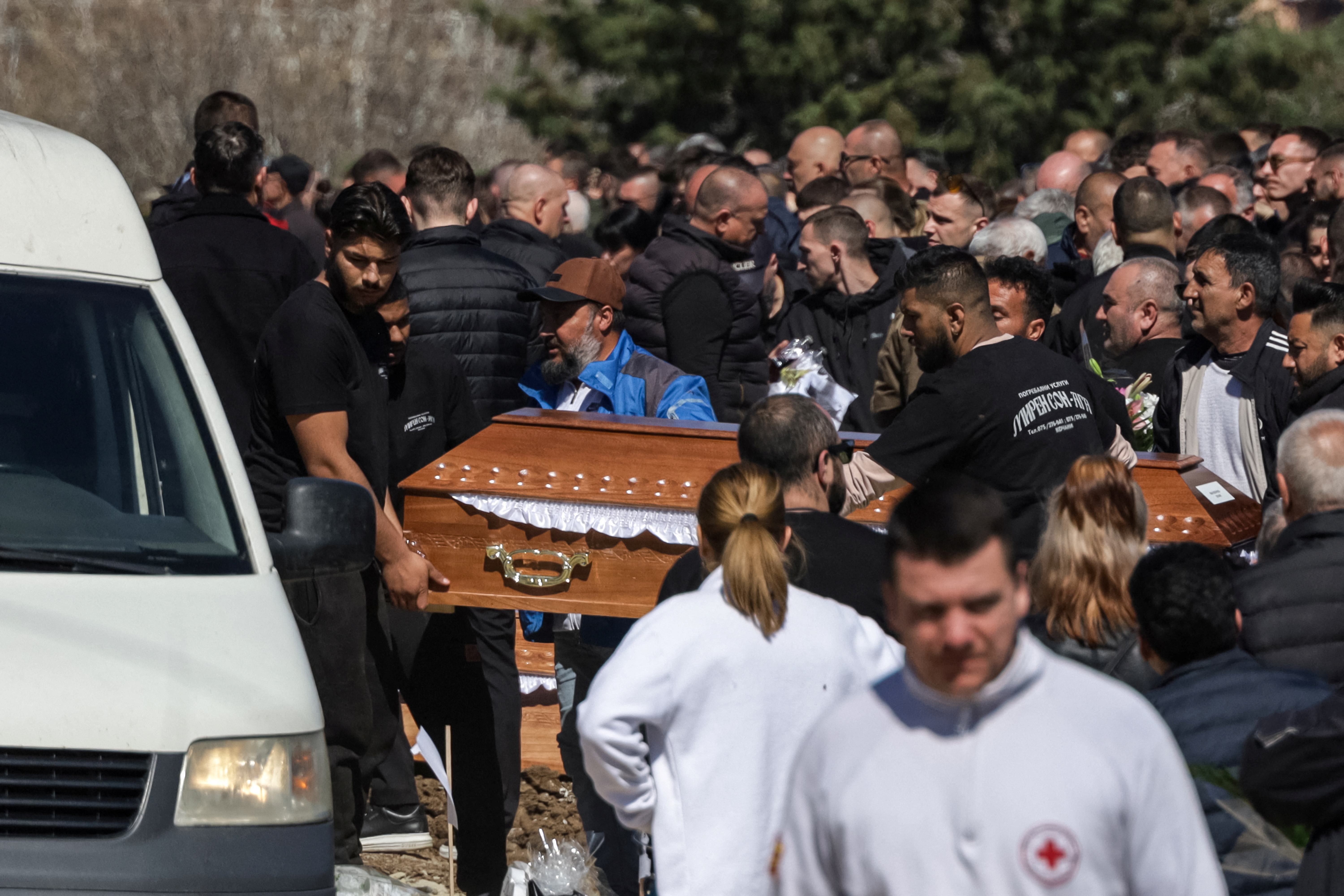 Families and friends attend a joint funeral for the victims of the fire at the Pulse nightclub in the town of Kocani, North Macedonia, March 20, 2025. REUTERS/Fatos Bytyci
