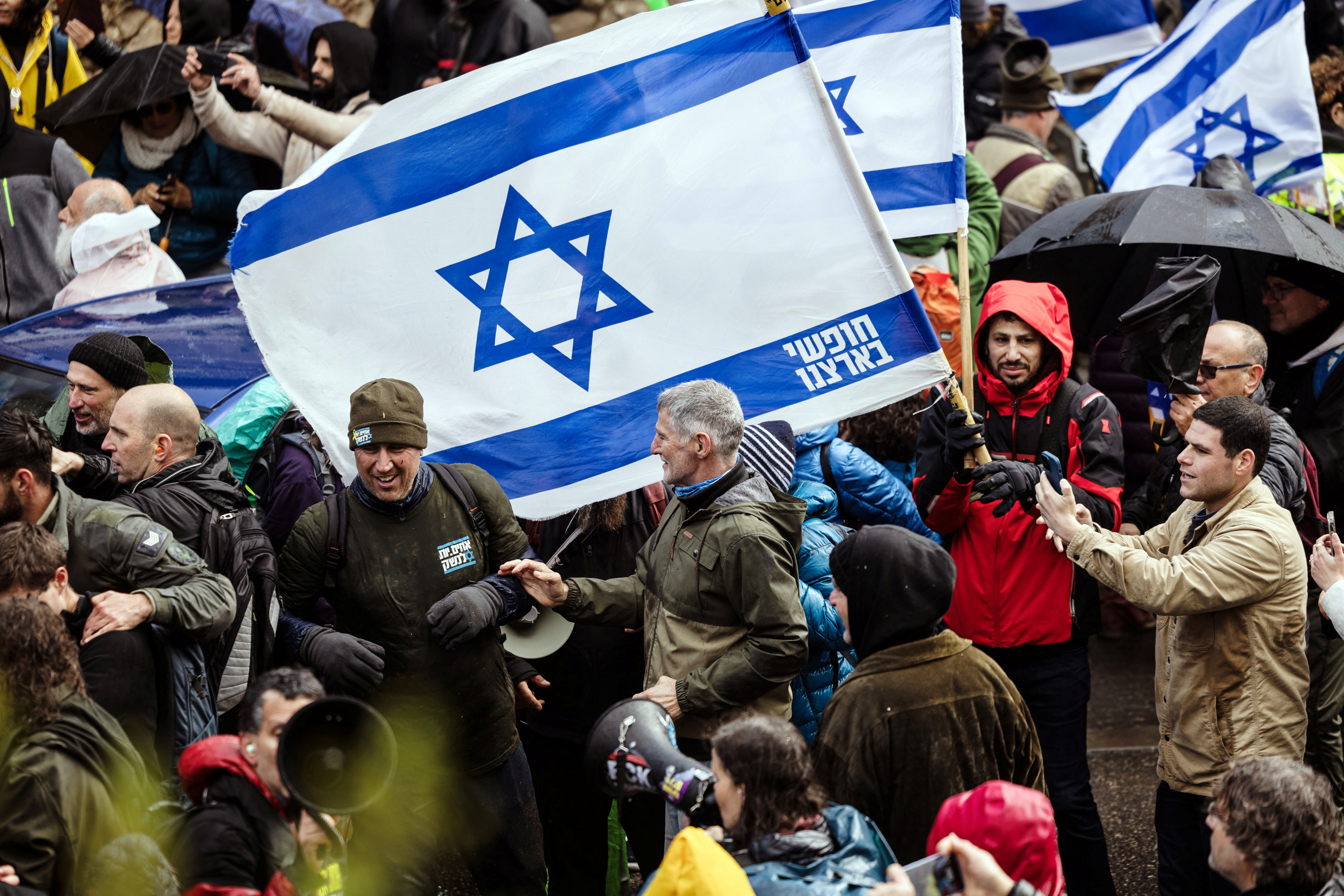 Leader of the Democrats party, Yair Golan, takes part in a protest against the Israeli government and Prime Minister Benjamin Netanyahu, demanding the release of all captives from Gaza, near the Prime Minister's residence in Jerusalem [Oren Ben Hakoon/Reuters]