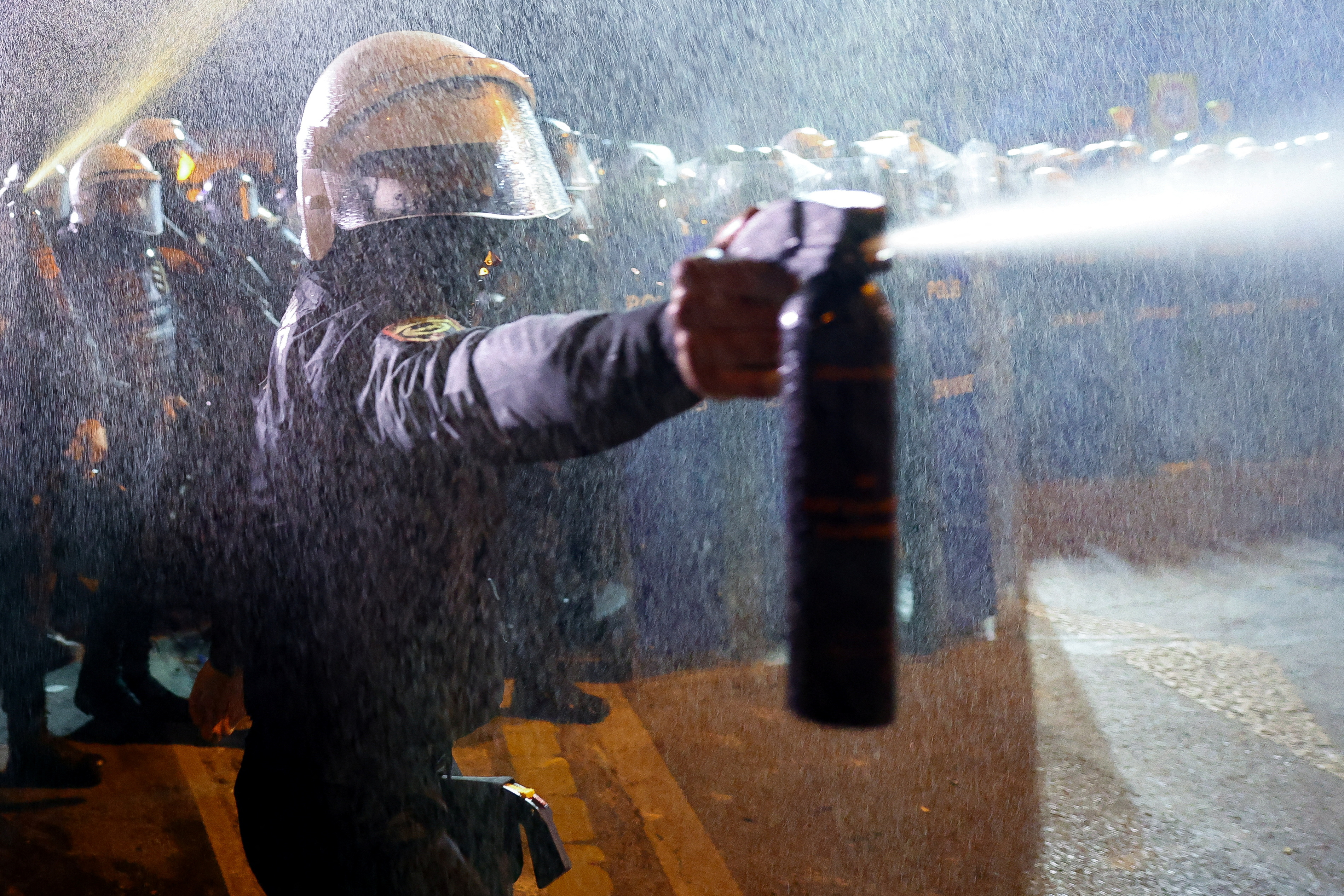 A police officer uses crowd control spray to disperse demonstrators during a protest against the detention of Istanbul Mayor Ekrem Imamoglu, in Istanbul, Turkey, March 22, 2025. REUTERS/Murad Sezer TPX IMAGES OF THE DAY