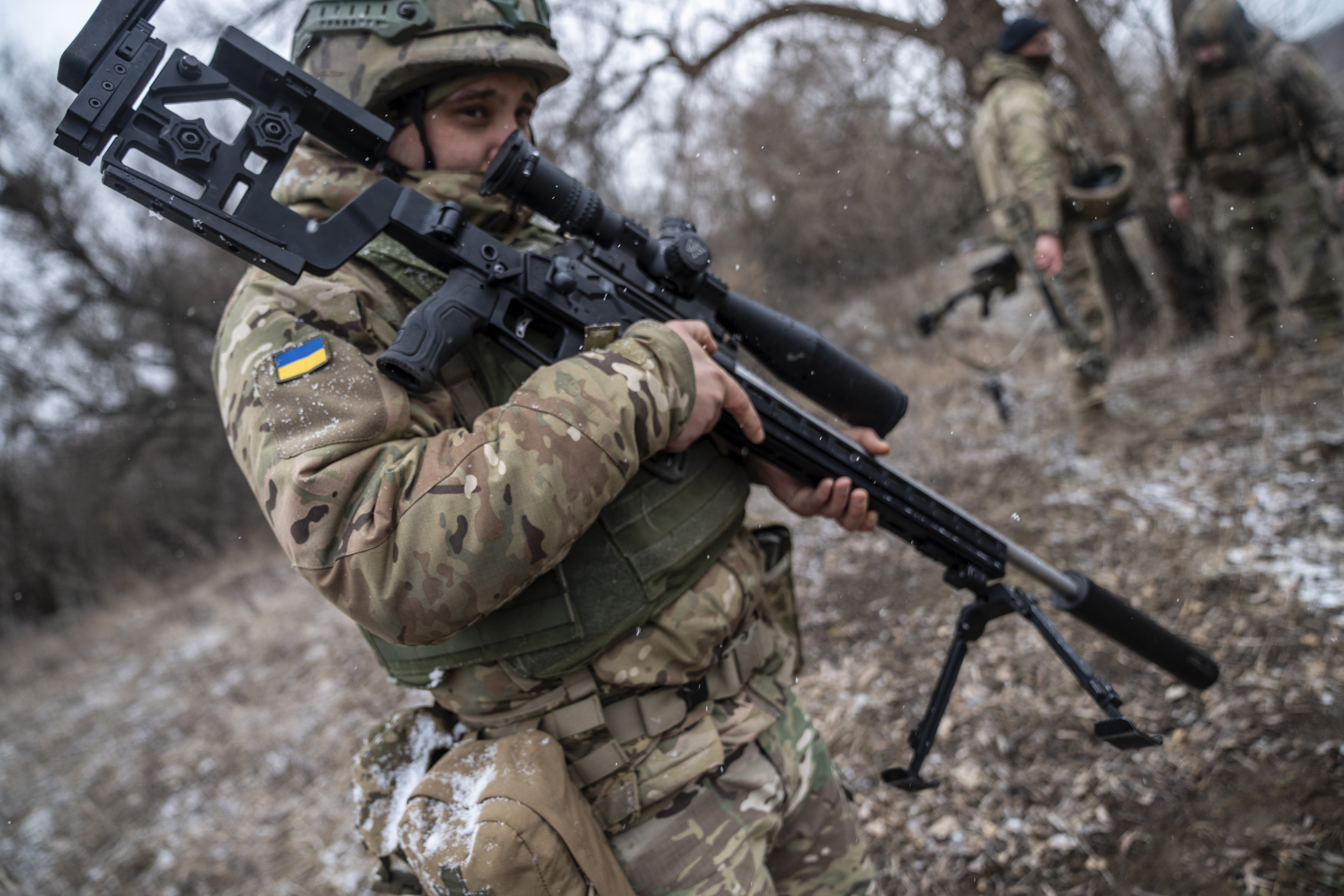 Ukrainian soldier from a sniper unit with a Savage 110 elite prestige 338 prepares to fire at a shooting range in Kharkiv region, Ukraine, on March 18, 2025.The unit operates with Ruger .338 Compact Magnum rifles of American origin, UAR-10 .308 and UAR-10M .308 rifles of Ukrainian origin, and Savage 110 Elite Precision .338 rifles, also of American origin. Photojournalist:Jose Colon