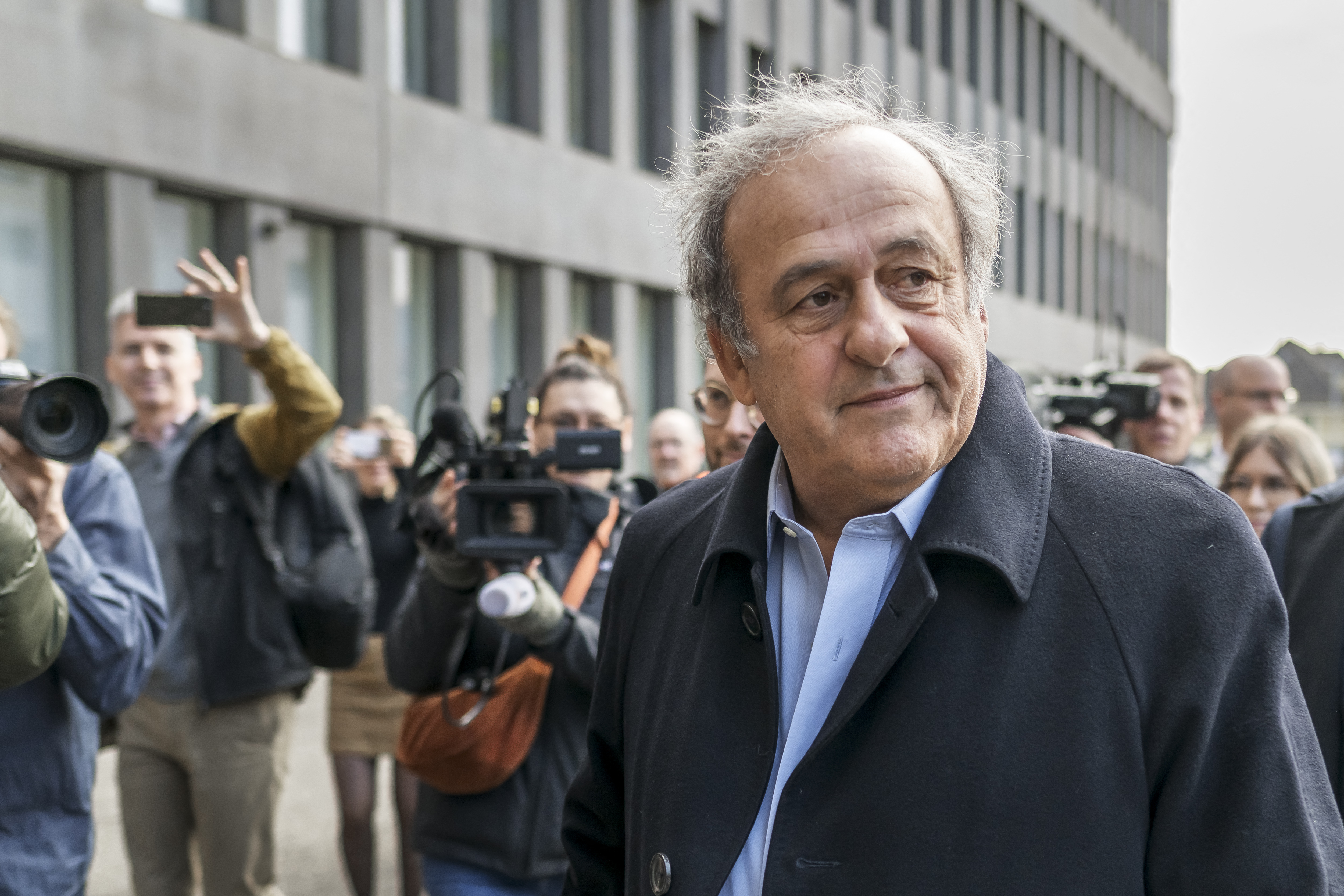 Michel Platini reacts.