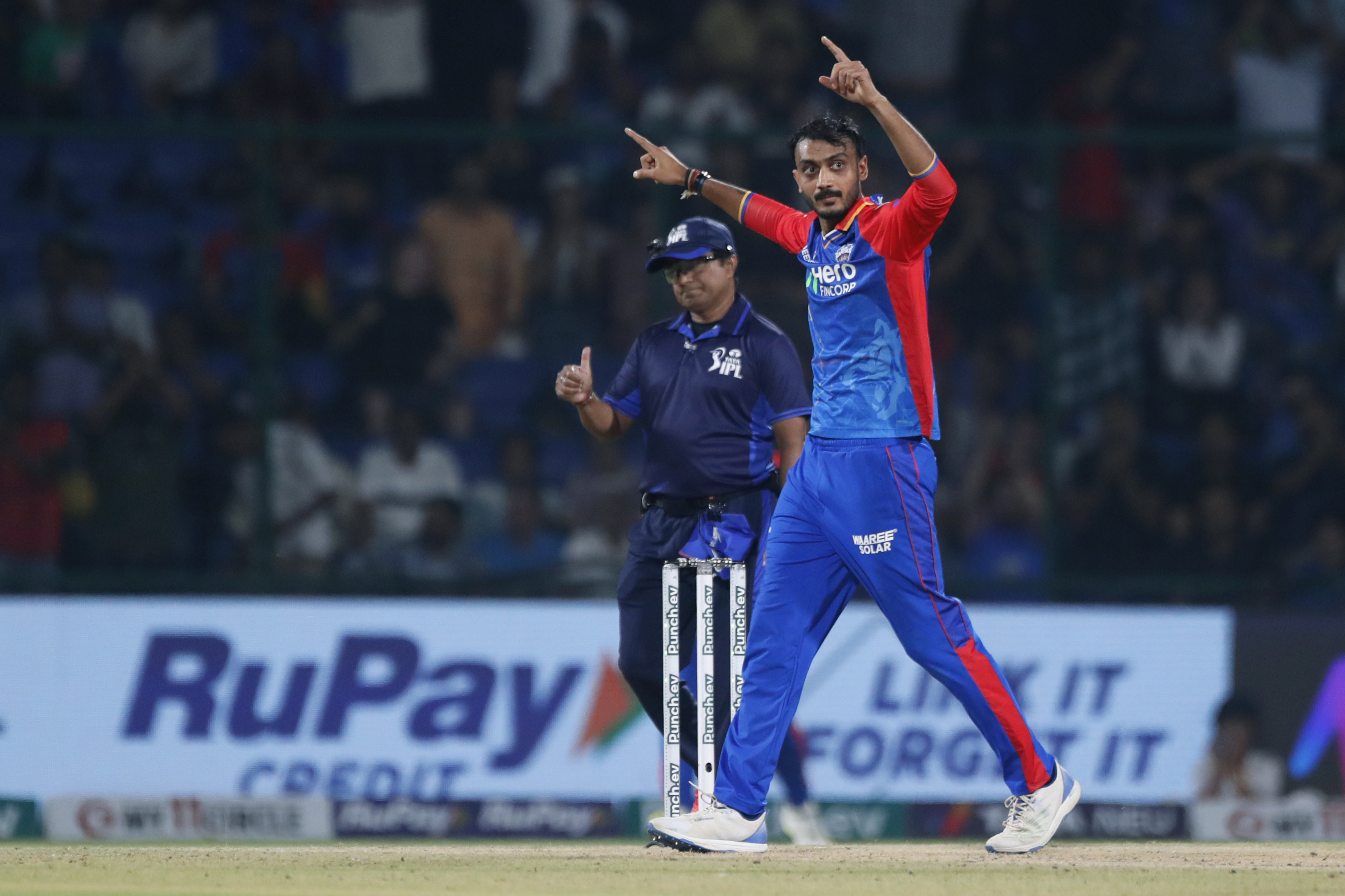 Delhi Capitals' Axar Patel celebrates the wicket of Gujarat Titans' Azmatullah Omarzai during the Indian Premier League cricket match between Delhi Capitals and Gujarat Titans in New Delhi, India, Wednesday, April 24, 2024. (AP Photo/Pankaj Nangia)