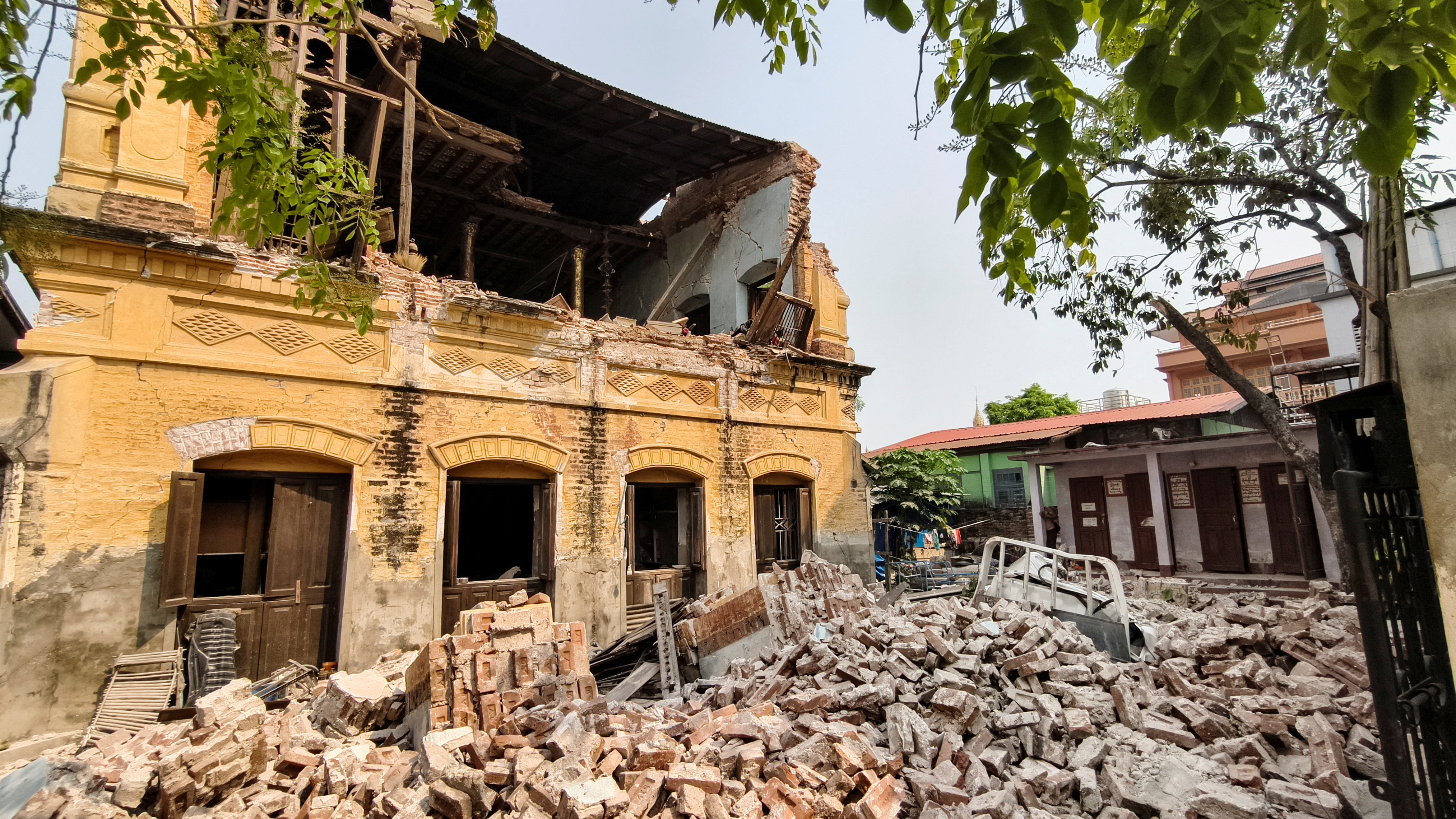 A view shows debris next to a damaged building after a strong earthquake struck central Myanmar, in Mandalay, Myanmar, March 29, 2025. REUTERS/Stringer TPX IMAGES OF THE DAY