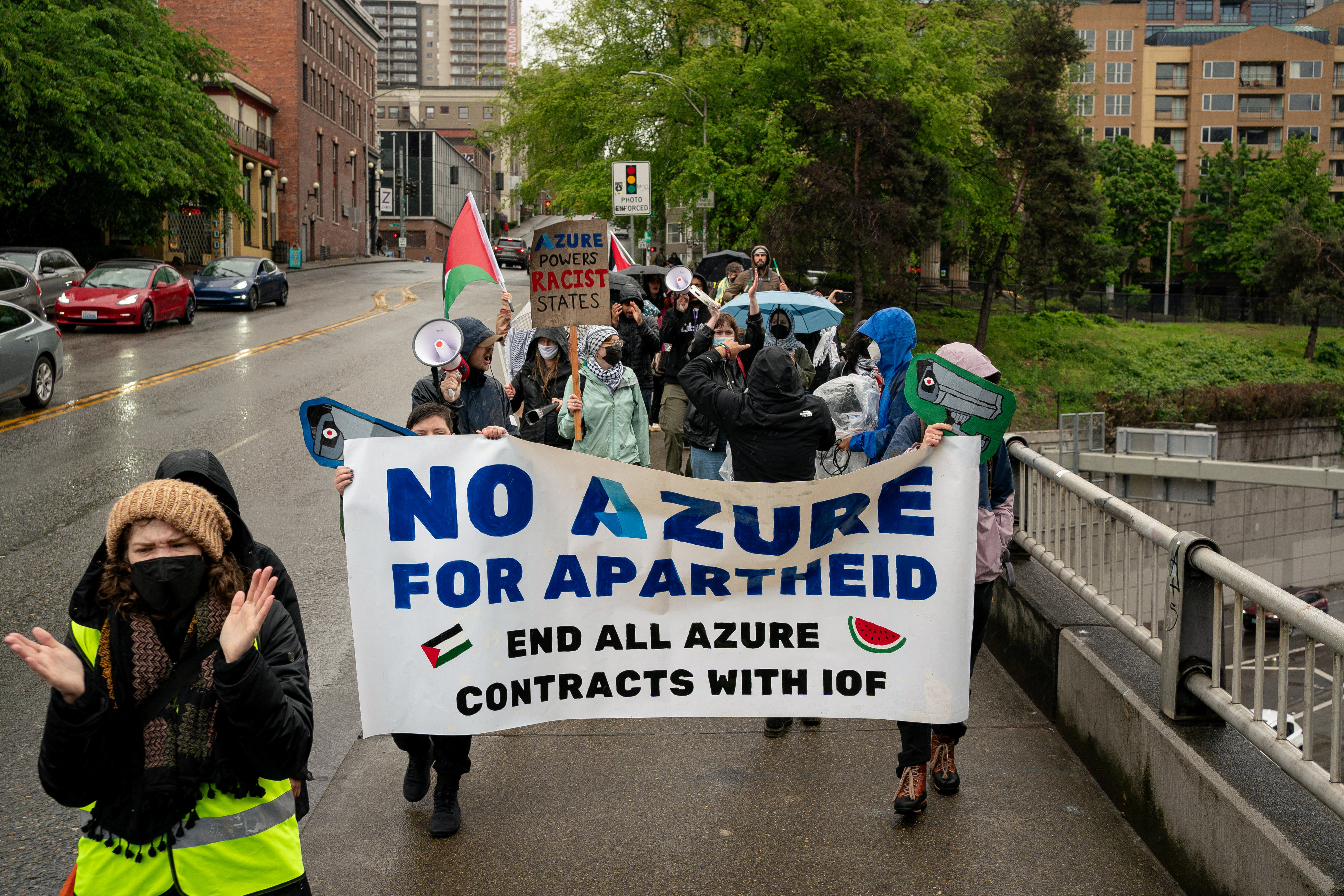 Demonstrators march in support of Palestinians in Gaza near the Microsoft Build conference, during the ongoing conflict between Israel and the Palestinian Islamist group Hamas, to call for the termination of Microsoft’s Azure contracts with Israel in Seattle, Washington, U.S. May 21, 2024. REUTERS/David Ryder