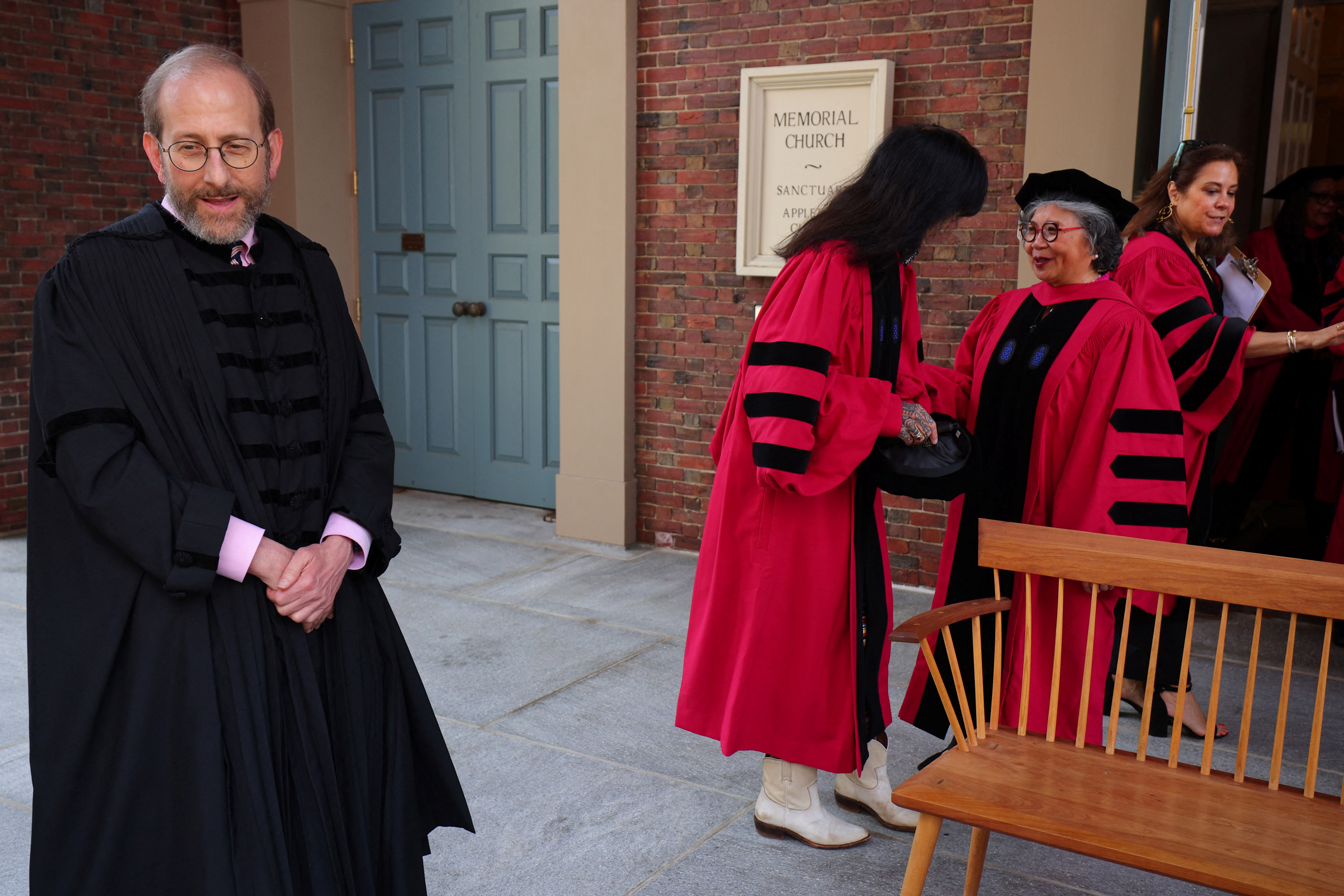 Interim president Alan Garber waits for the the honorary degree recipients to assemble for a group photograph before the 373rd Commencement Exercises at Harvard University in Cambridge, Massachusetts, U.S., May 23, 2024.
