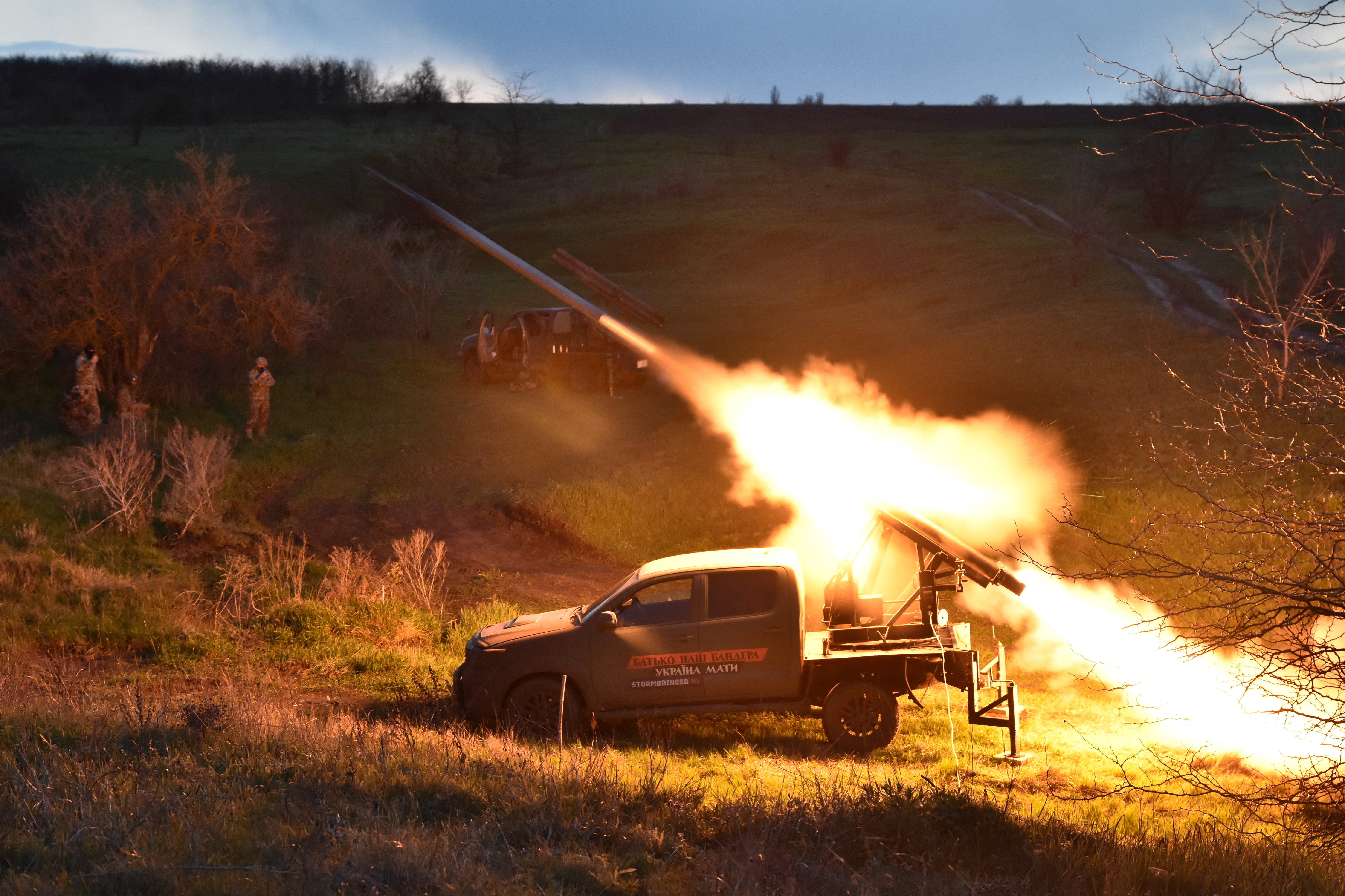 Members of Ukraine's 65th Separate Mechanised Brigade fire a small multiple launch rocket system (MLRS) towards Russian troops along the front line in Zaporizhzhia region, Ukraine, on April 8, 2025 [Handout/Andriy Andriyenko via Reuters]