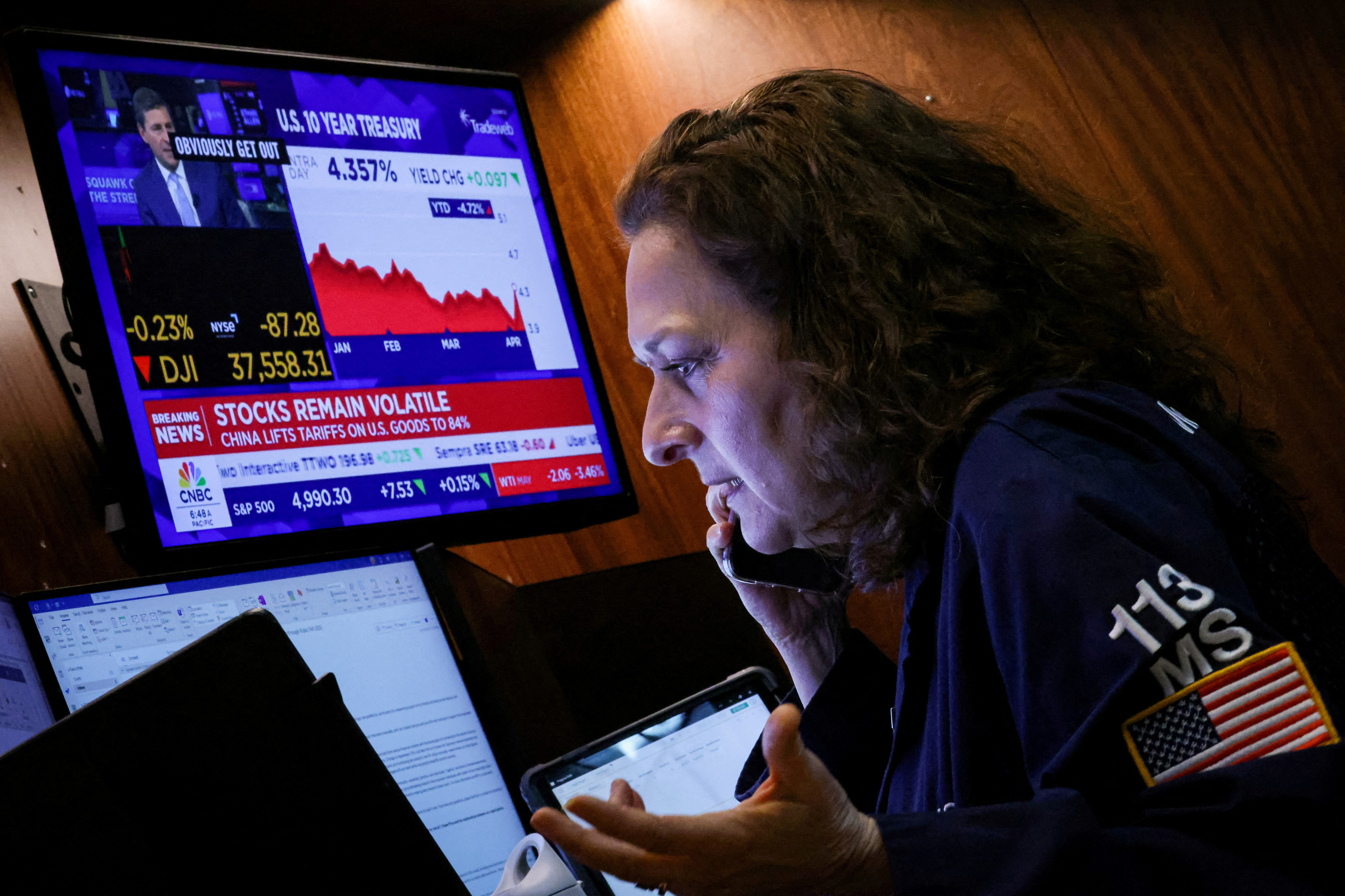 A trader works on the floor at the New York Stock Exchange.