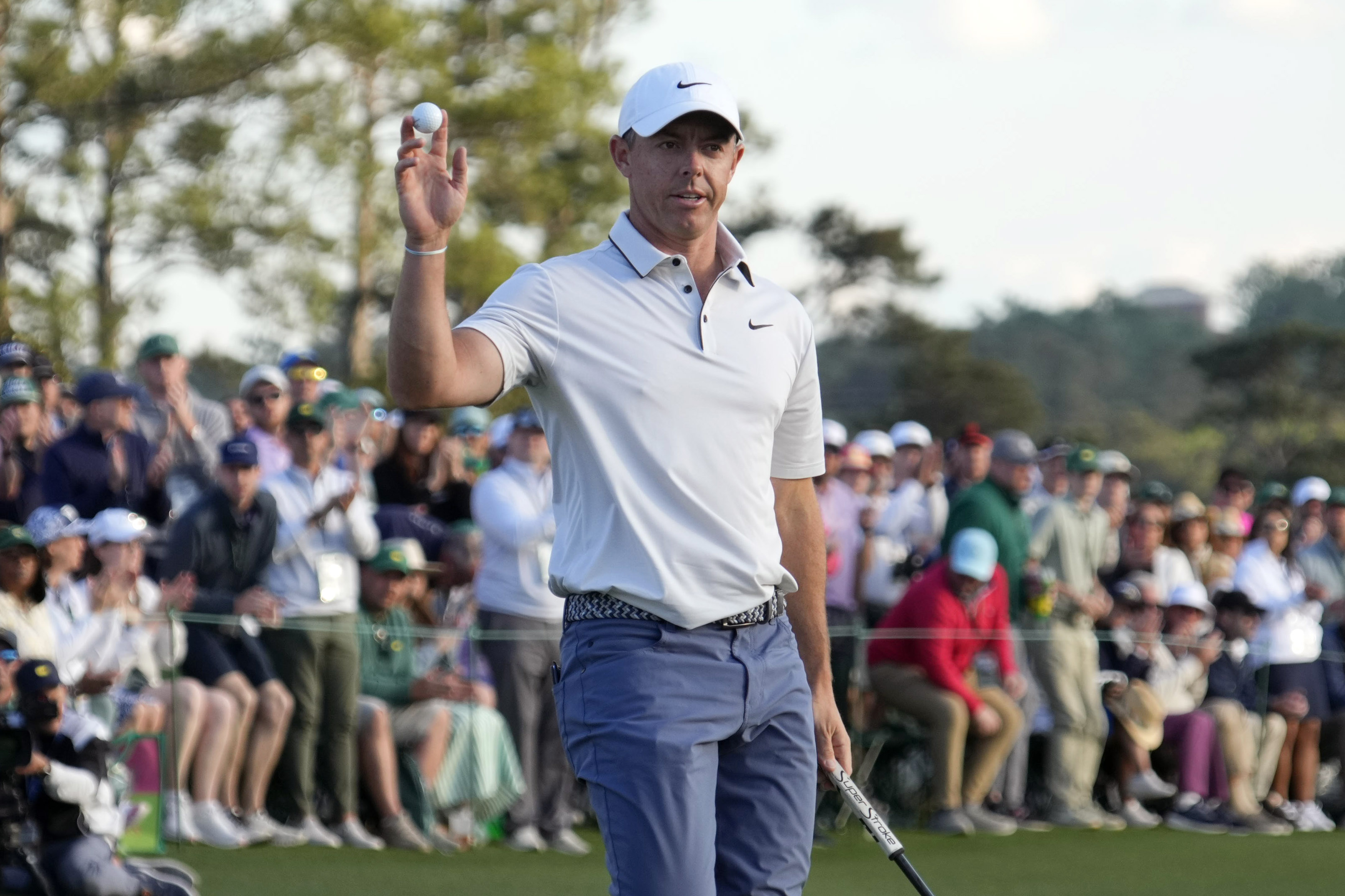 Apr 12, 2025; Augusta, Georgia, USA; Rory McIlroy reacts after putting on the 18th green during the third round of the Masters Tournament at Augusta National Golf Club. Mandatory Credit: Michael Madrid-Imagn Images
