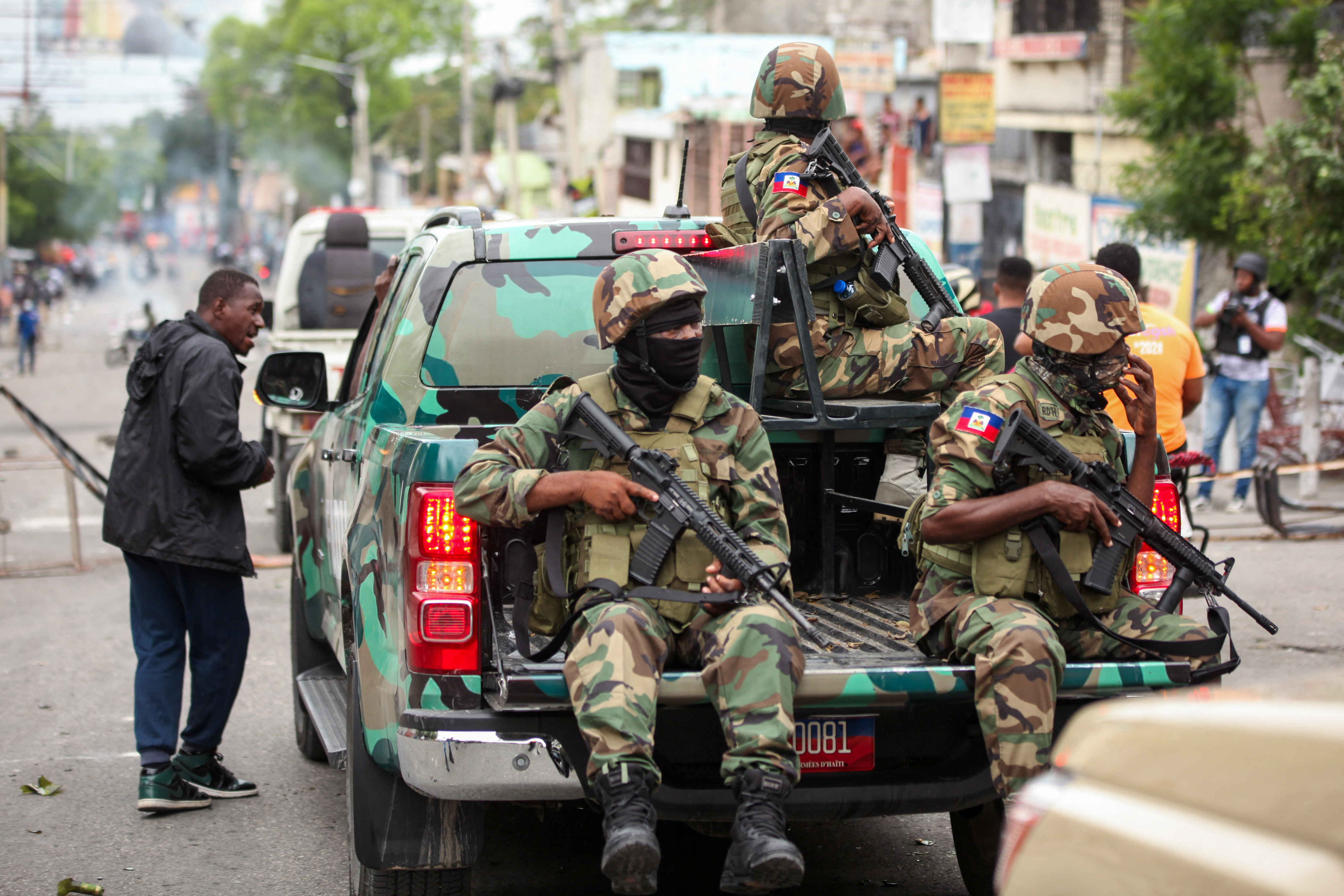 Haitian security forces patrol during a protest against insecurity