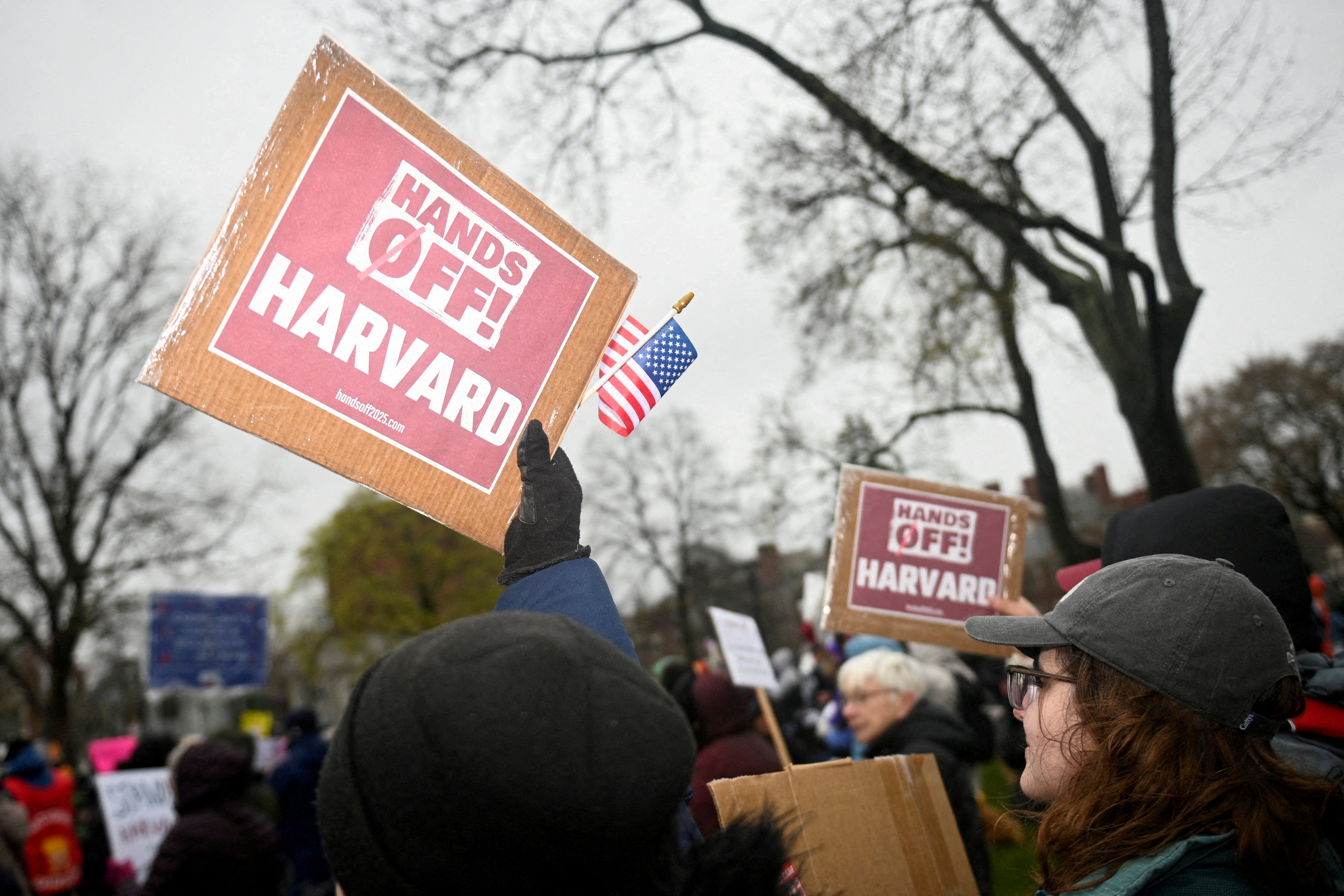 Demonstrators rally on Cambridge Common in a protest organized by the City of Cambridge calling on Harvard leadership to resist interference at the university by the federal government in Cambridge, Massachusetts, U.S. April 12, 2025.