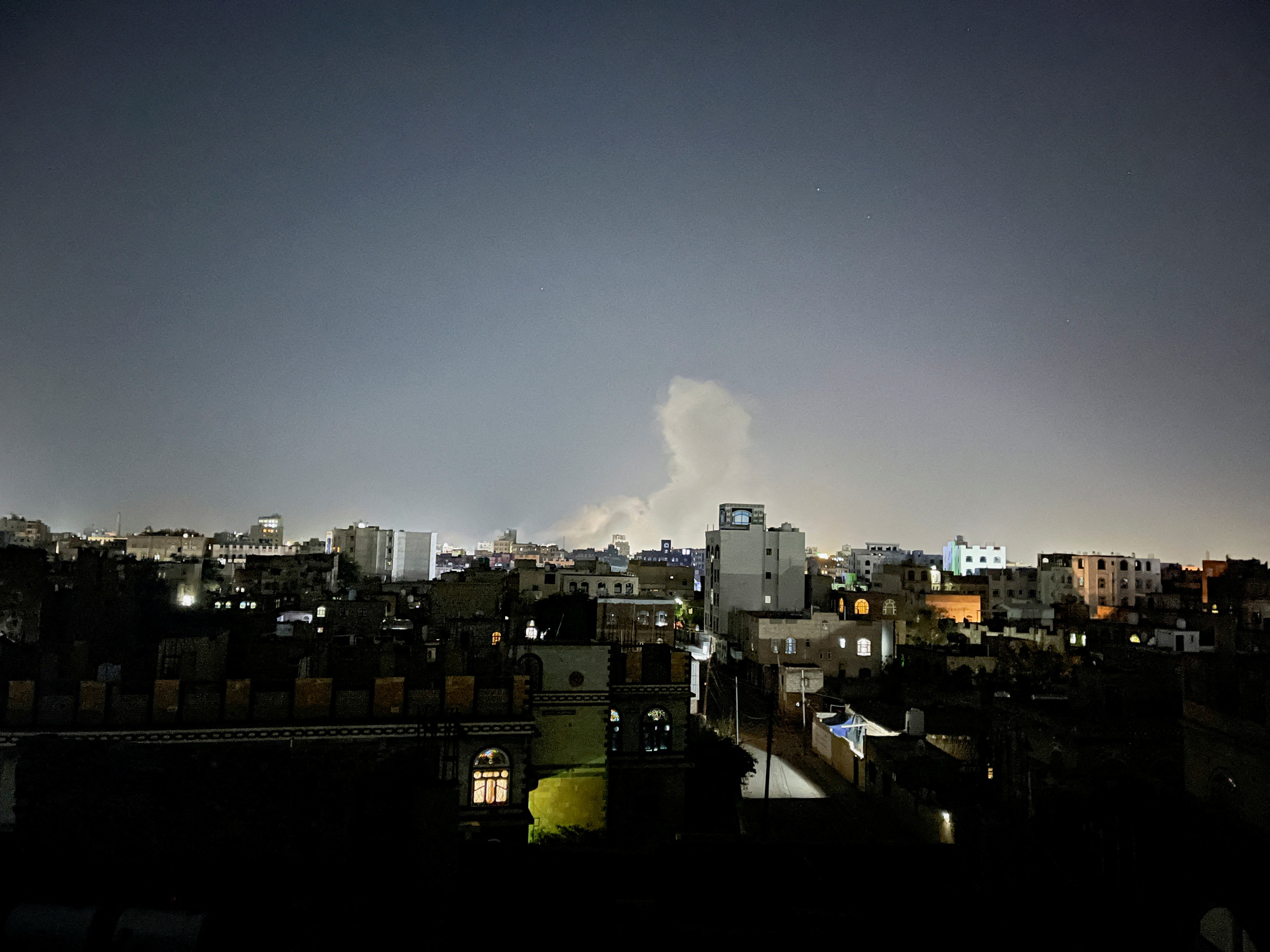 Smoke billows from the site of a US air strike in Sanaa, Yemen April 26, 2025. [File: Khaled Abdullah/Reuters]