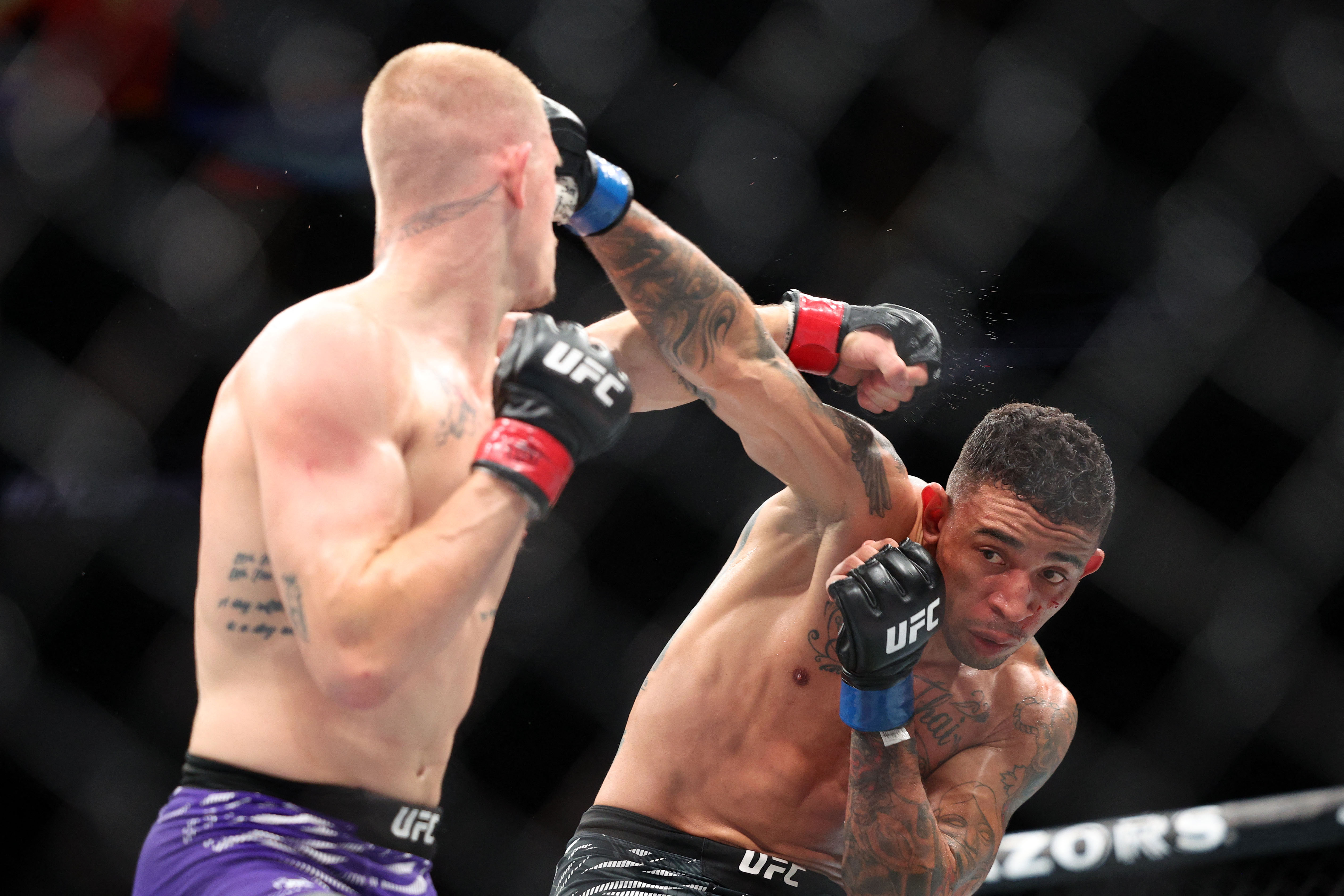 Ian Machado Garry and Carlos Prates in action.