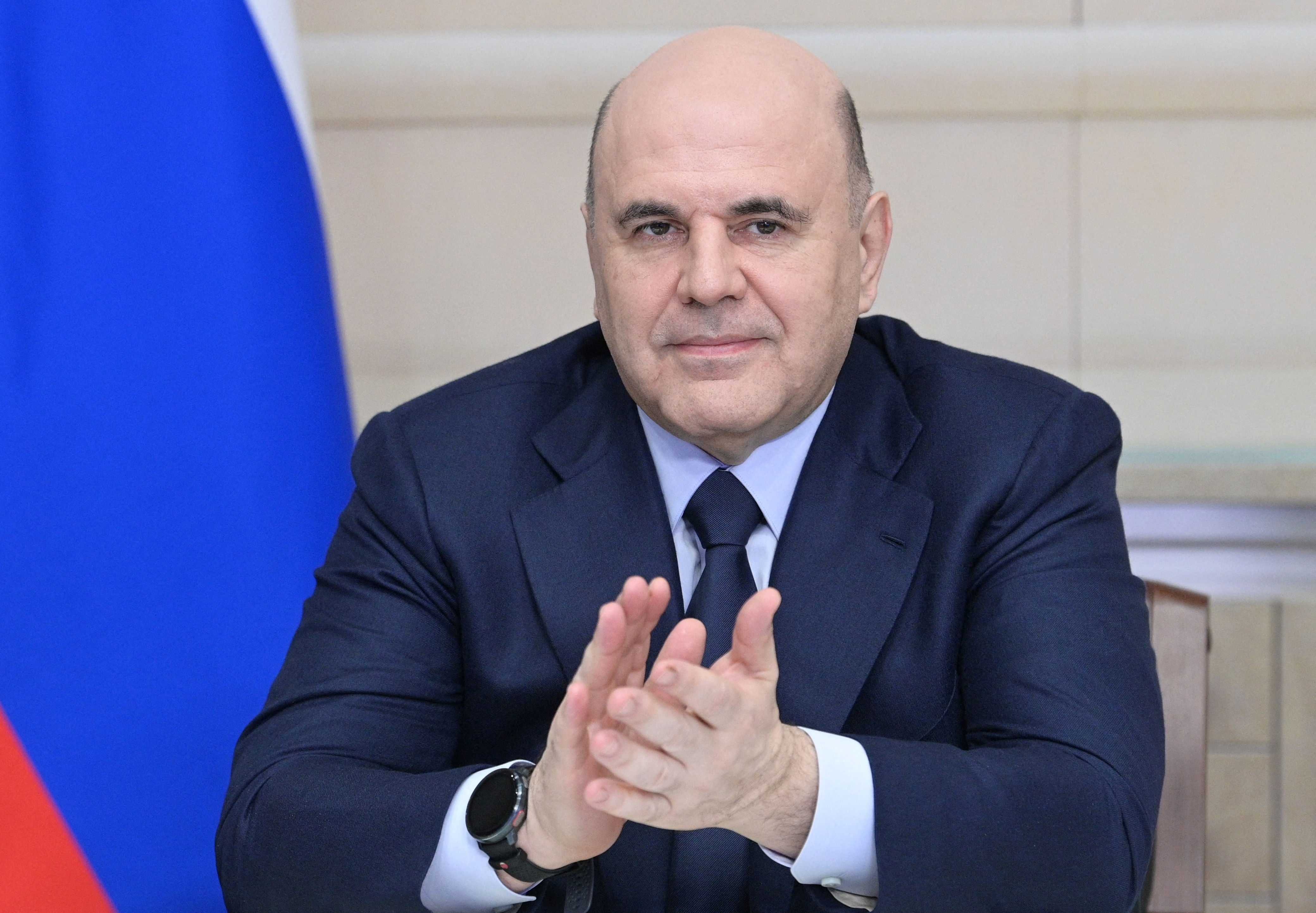 Russian Prime Minister Mikhail Mishustin takes part in a ceremony, dedicated to the start of the construction of a new road bridge between Russia and North Korea across the Tumen river, via a video link from Moscow, Russia, April 30, 2025. Sputnik/Alexander Astafyev/Pool via REUTERS ATTENTION EDITORS - THIS IMAGE WAS PROVIDED BY A THIRD PARTY.