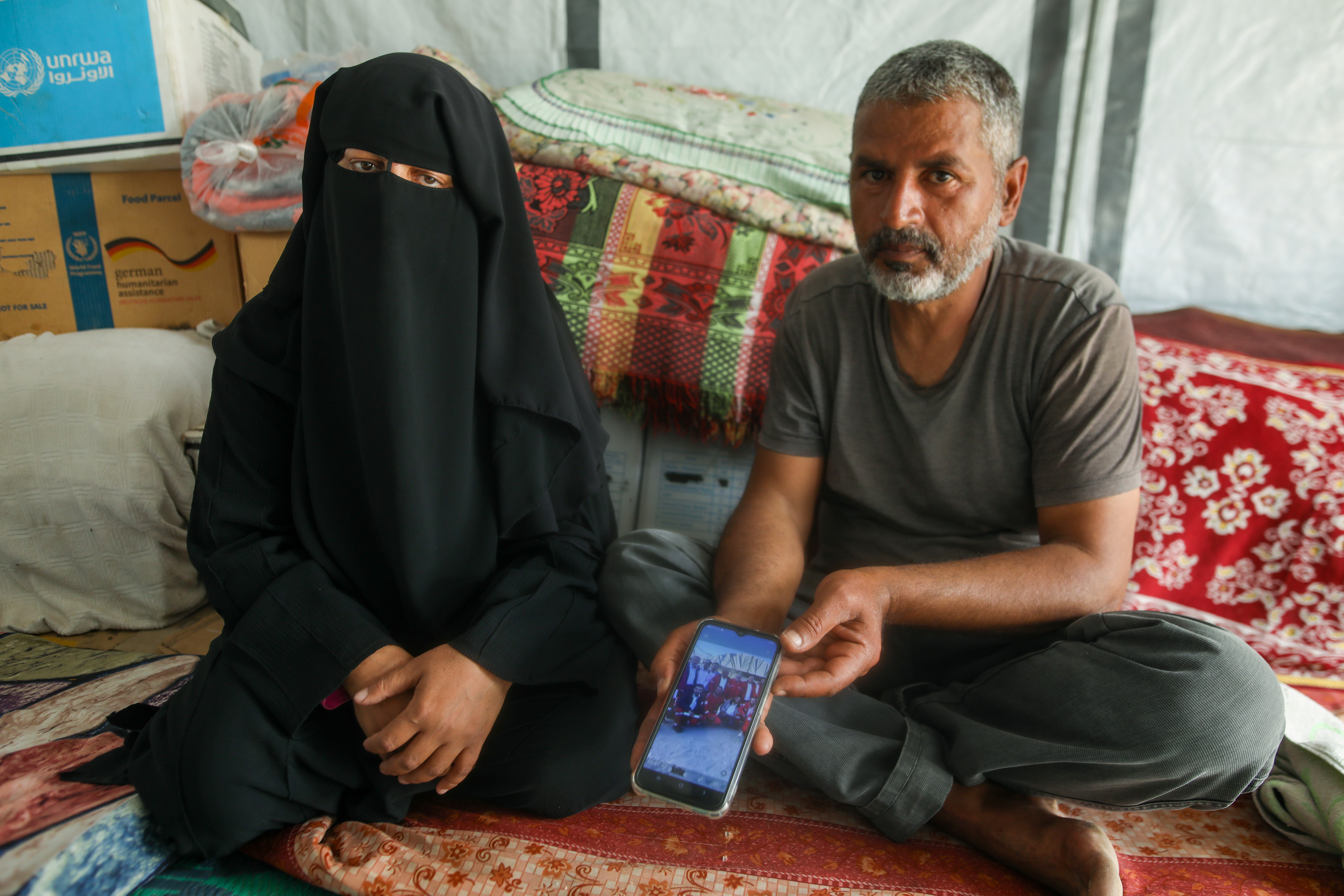 Forgive me mother [Yousef al-Zanoun/Al Jazeera]