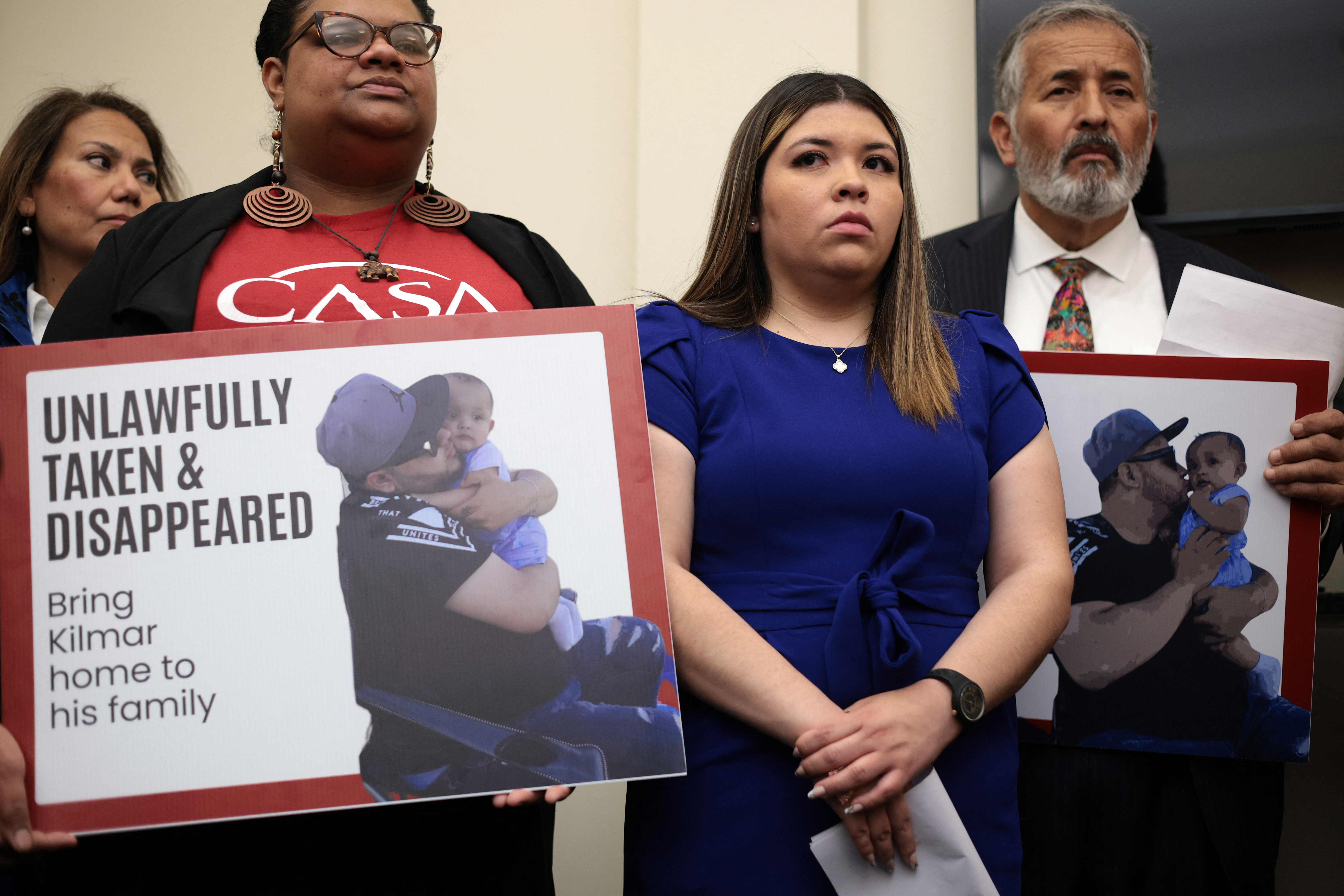 WASHINGTON, DC - APRIL 09: Wife of Kilmar Abrego Garcia, Jennifer Vasquez Sura (2nd R), listens during a news conference to discuss his husband’s arrest and deportation during a news conference at Cannon House Office Building on April 9, 2025 in Washington, DC. The Congressional Hispanic Caucus held a news conference to discuss the deportation of Maryland resident Kilmar Abrego Garcia to the maximum security prison Terrorism Confinement Center (CECOT) in El Salvador, an incident the Trump administration claims as “an administrative error,” but refuses to bring Abrego Garcia back to the United States. Alex Wong/Getty Images/AFP (Photo by ALEX WONG / GETTY IMAGES NORTH AMERICA / Getty Images via AFP)