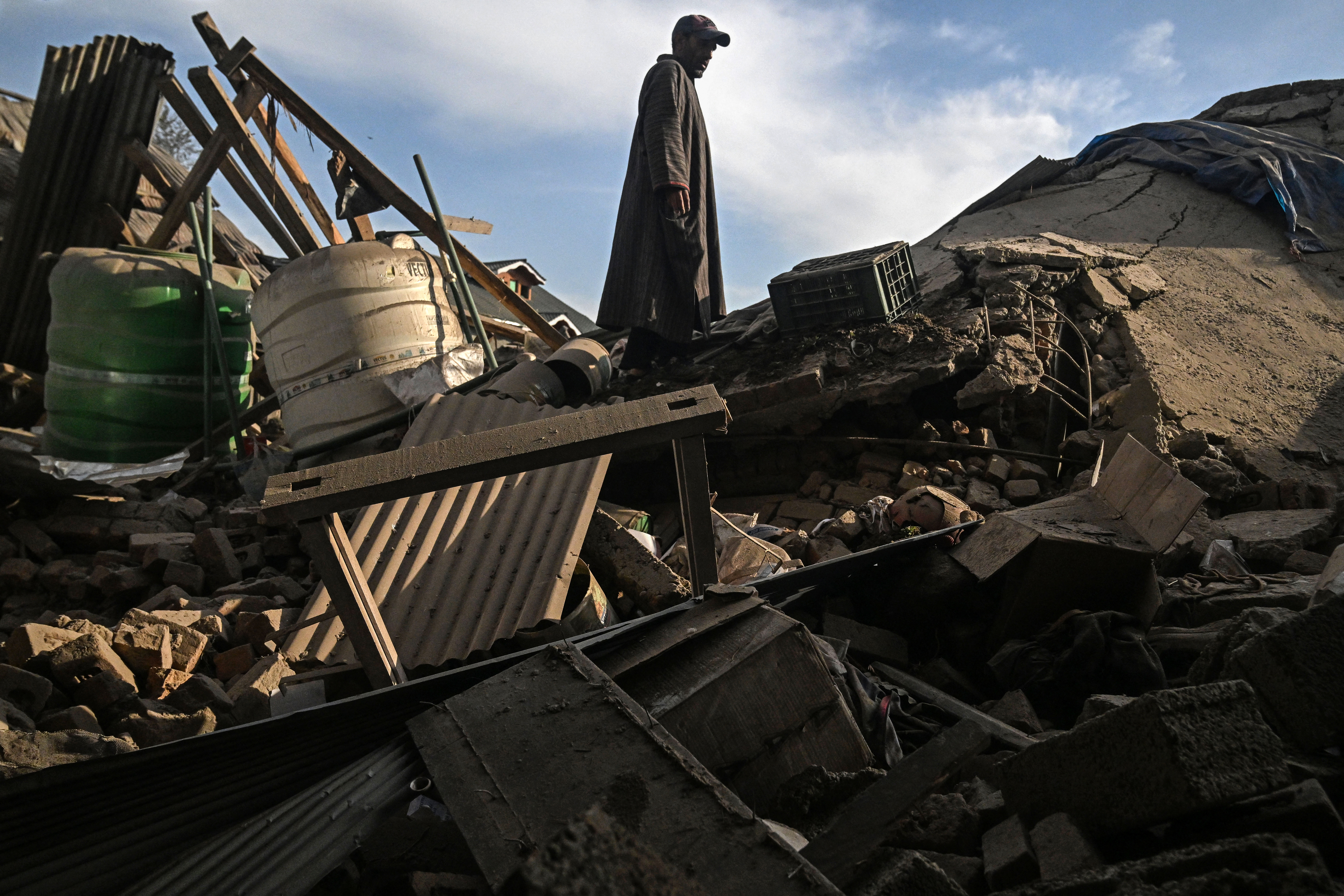 Homes destroyed in Kashmir after deadly attack sparks manhunt